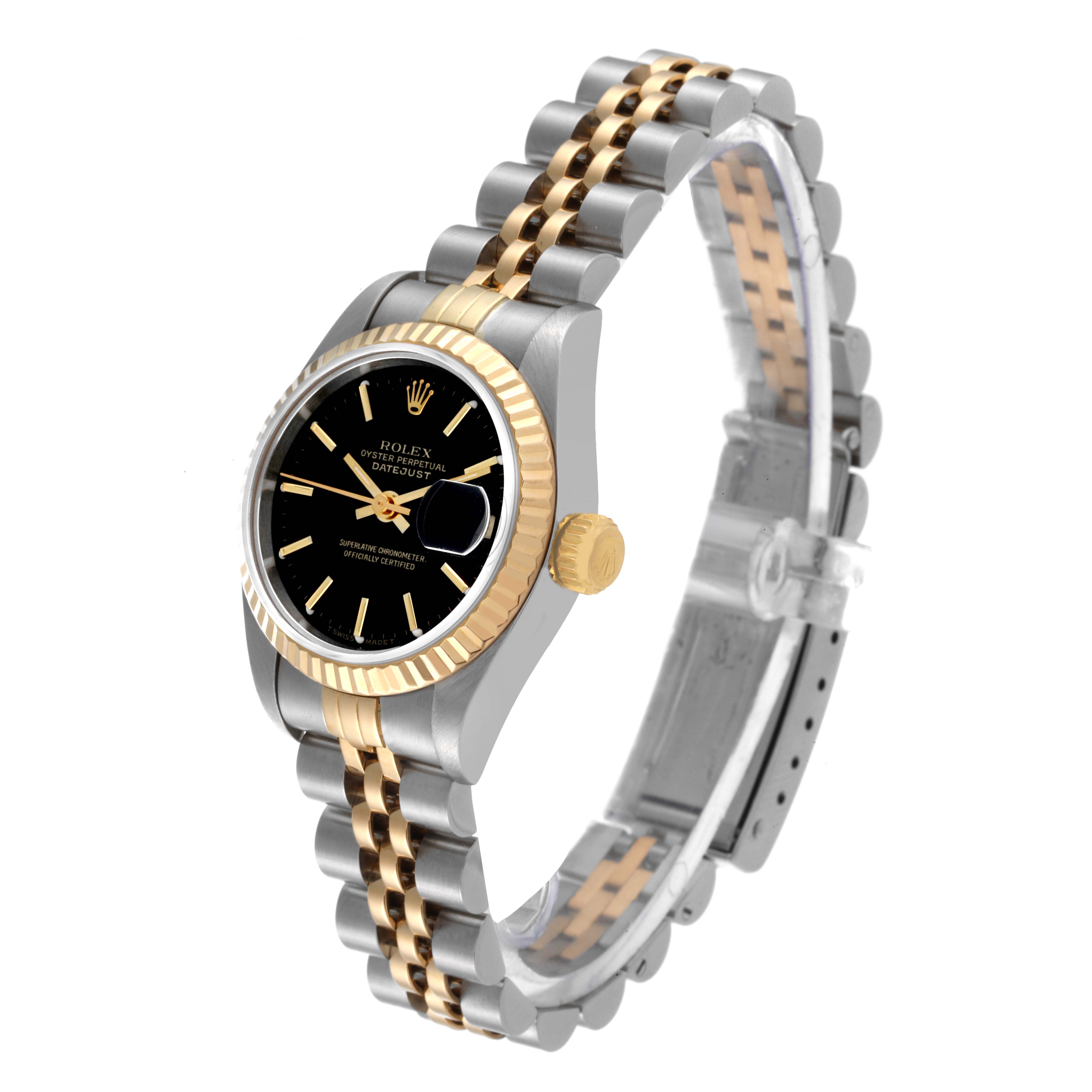 This is a Rolex Datejust 69173 Women's Steel and Gold (two tone) Black Dial 69173 Women's Steel and Gold (two tone) Black Dial watch showing the face, bezel, crown, and two-tone bracelet at an angled view.