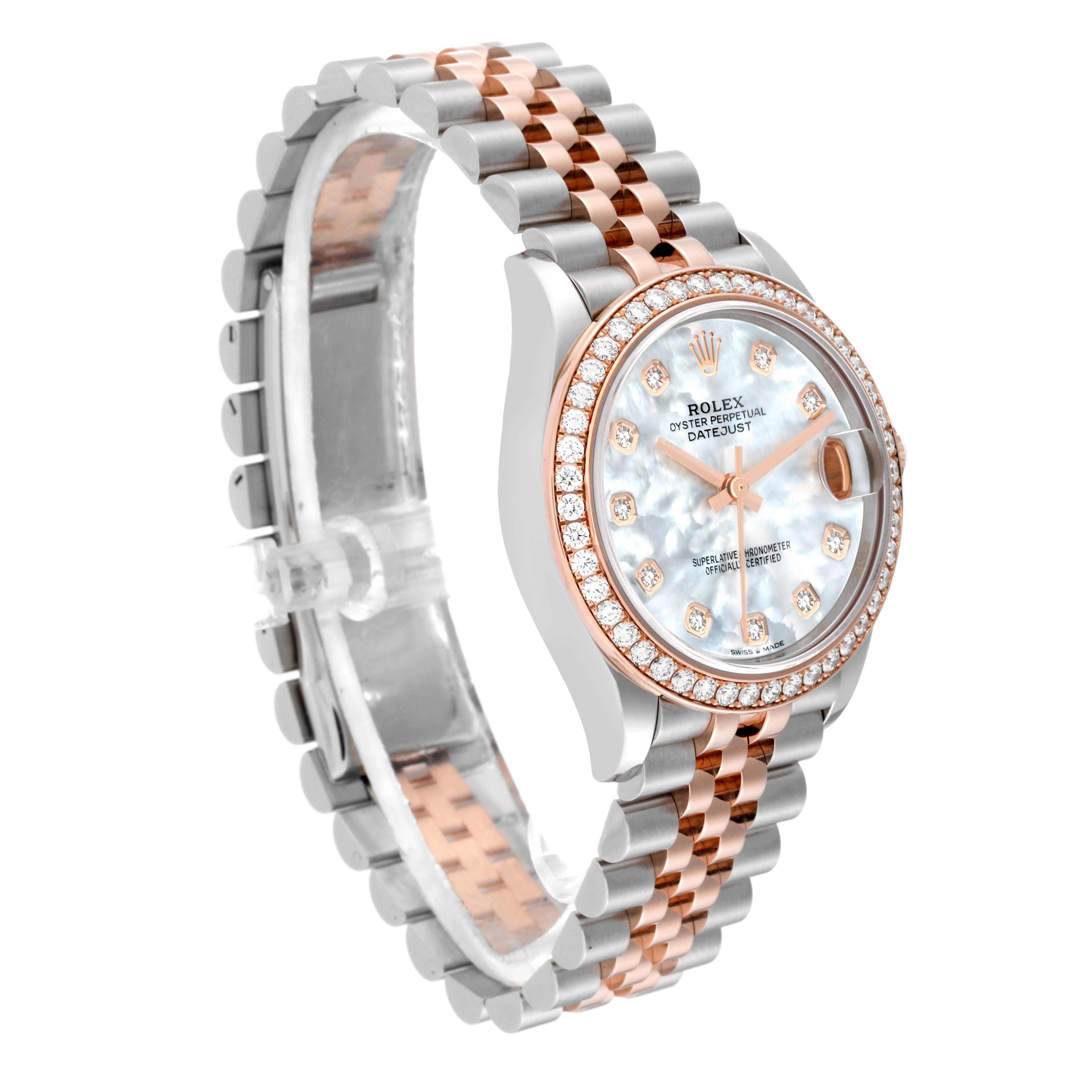 The image shows a Rolex Mid-Size 278381 Women
s Steel and Gold (two tone) Mother of Pearl Dial 278381 Women
s Steel and Gold (two tone) Mother of Pearl Dial Datejust watch at a three-quarter angle, showcasing its bracelet, bezel, and dial.