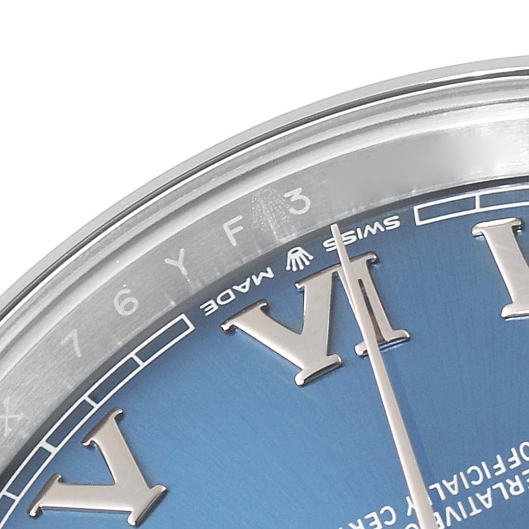 The image shows a close-up of the dial, bezel, and hands of a Rolex Datejust 41 126300 Men's Stainless Steel Blue Dial 126300 Men's Stainless Steel Blue Dial watch.