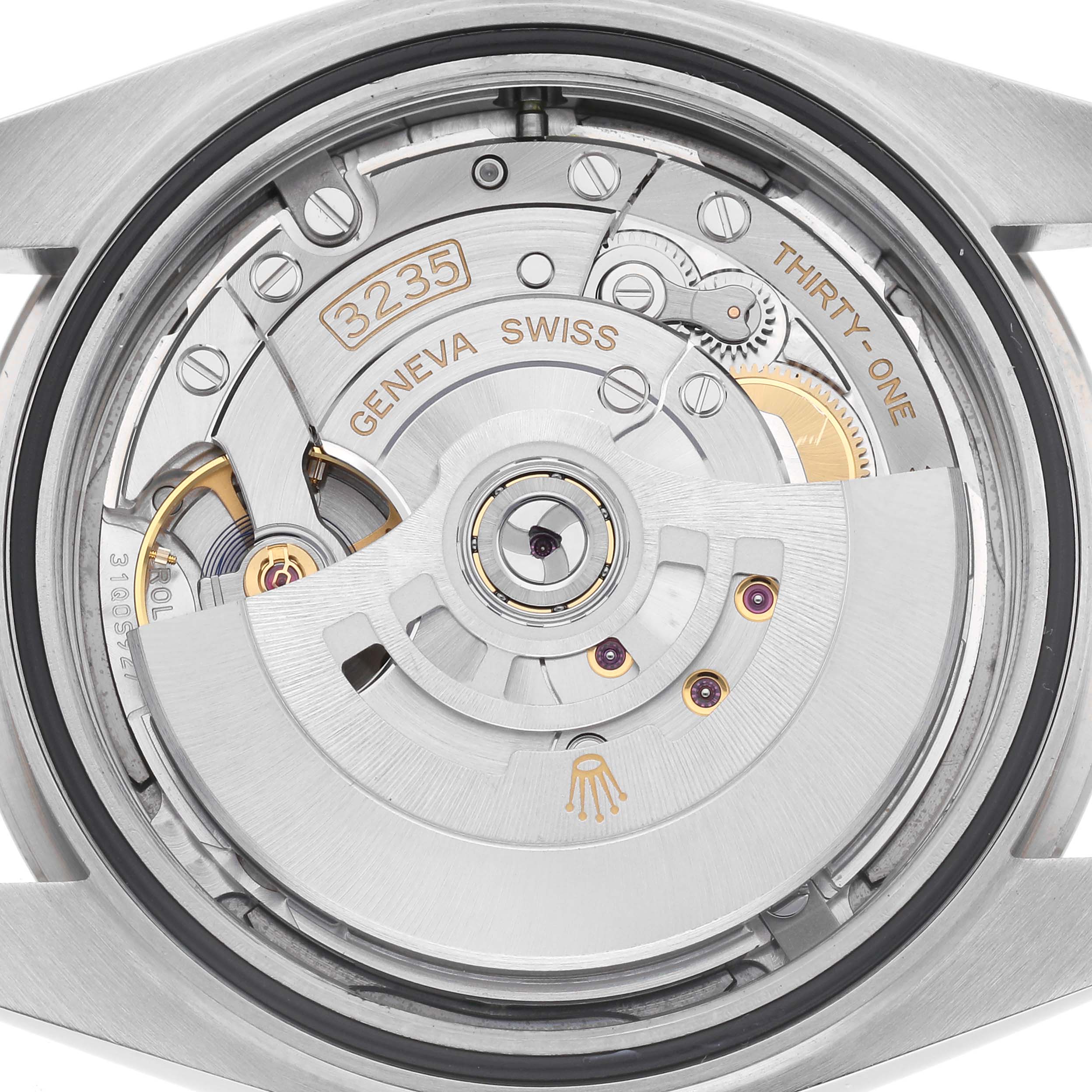 The image shows the movement of a Rolex Datejust 41 126334 Men
s Stainless Steel Grey Dial 126334 Men
s Stainless Steel Grey Dial, featuring the intricate internal mechanics and rotor from the back.