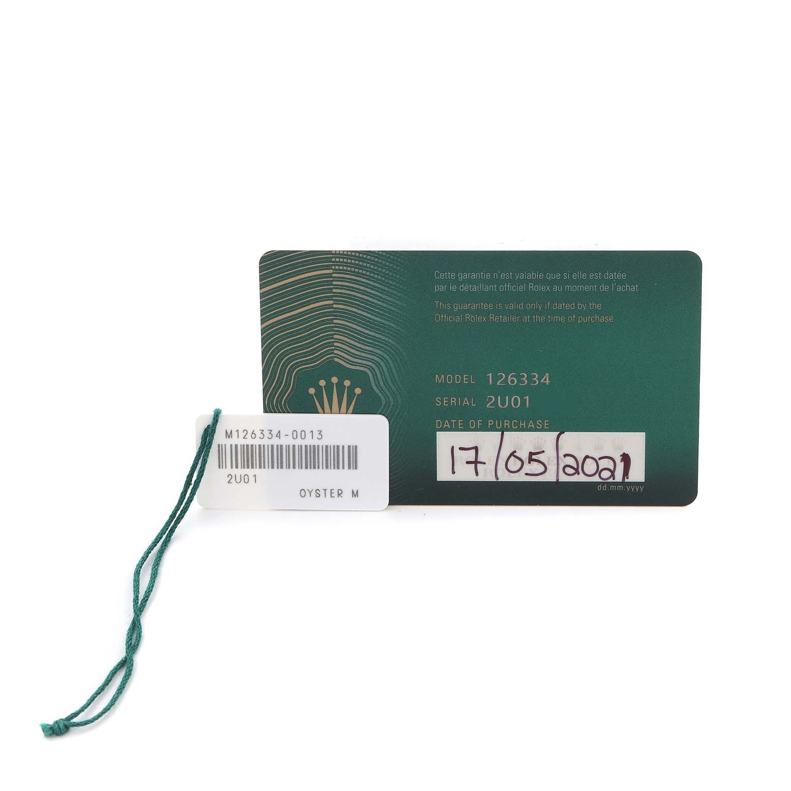 The image shows the warranty card and tags for a Rolex Datejust 41 126334 Men
s Stainless Steel Grey Dial 126334 Men
s Stainless Steel Grey Dial model.