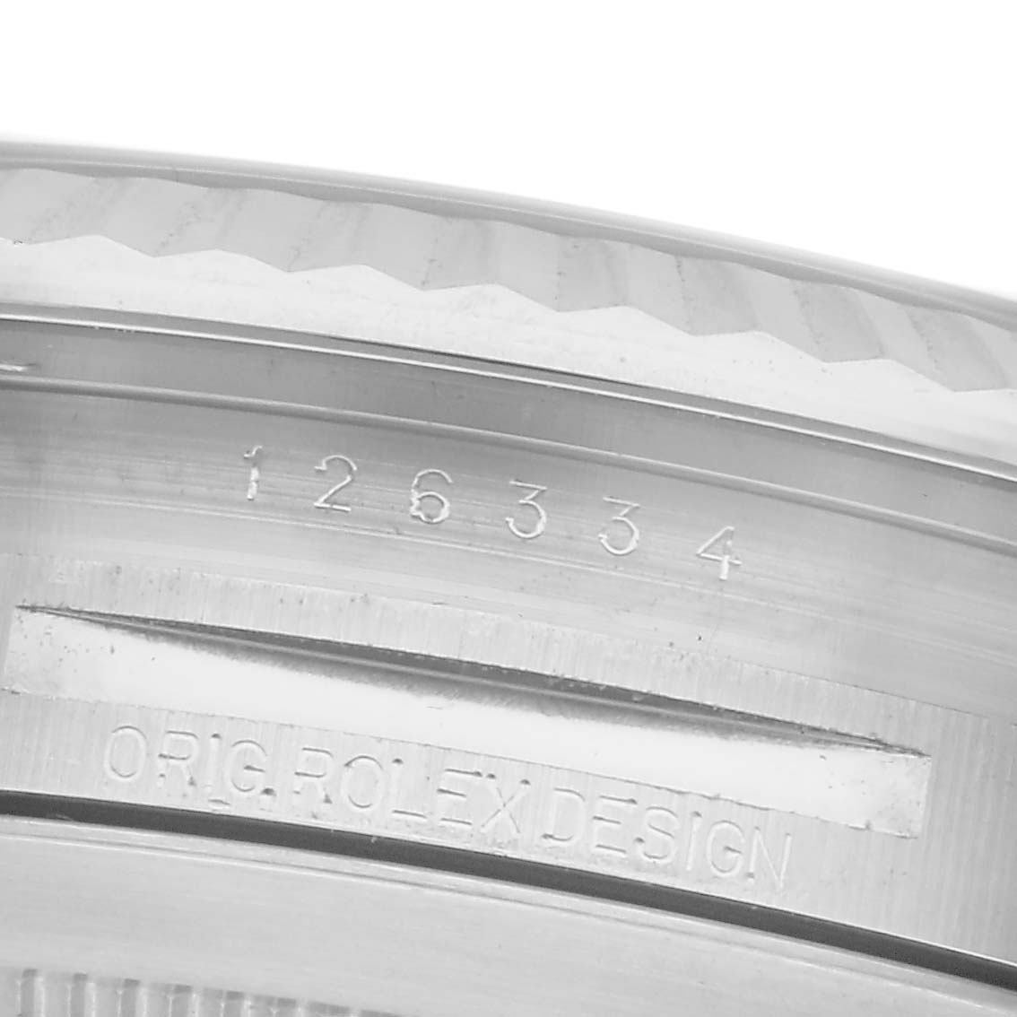The image shows a close-up of the inner bezel area of a Rolex Datejust 41 126334 Men
s Stainless Steel Grey Dial 126334 Men
s Stainless Steel Grey Dial watch, featuring engravings with the model number.
