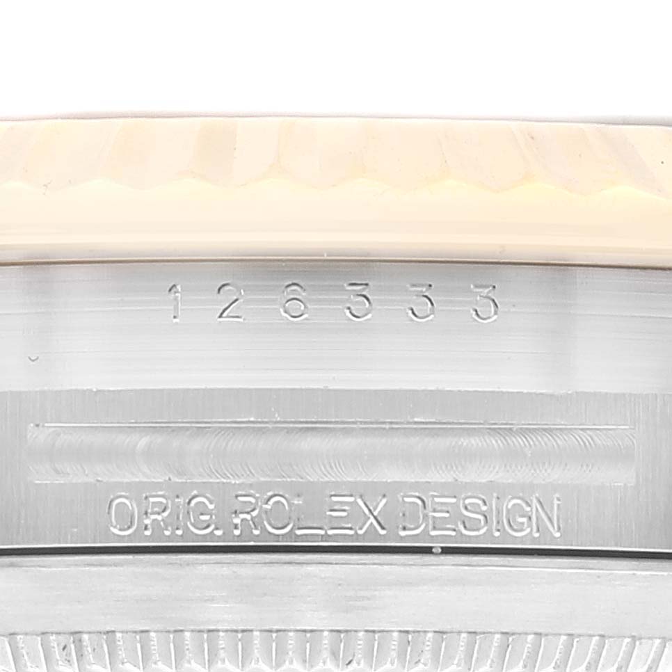 The image shows a close-up of the case side of a Rolex Datejust 41 126333 Men's Steel and Gold (two tone) Black Dial 126333 Men's Steel and Gold (two tone) Black Dial model, highlighting the serial number and "ORIG. ROLEX DESIGN" engraving.
