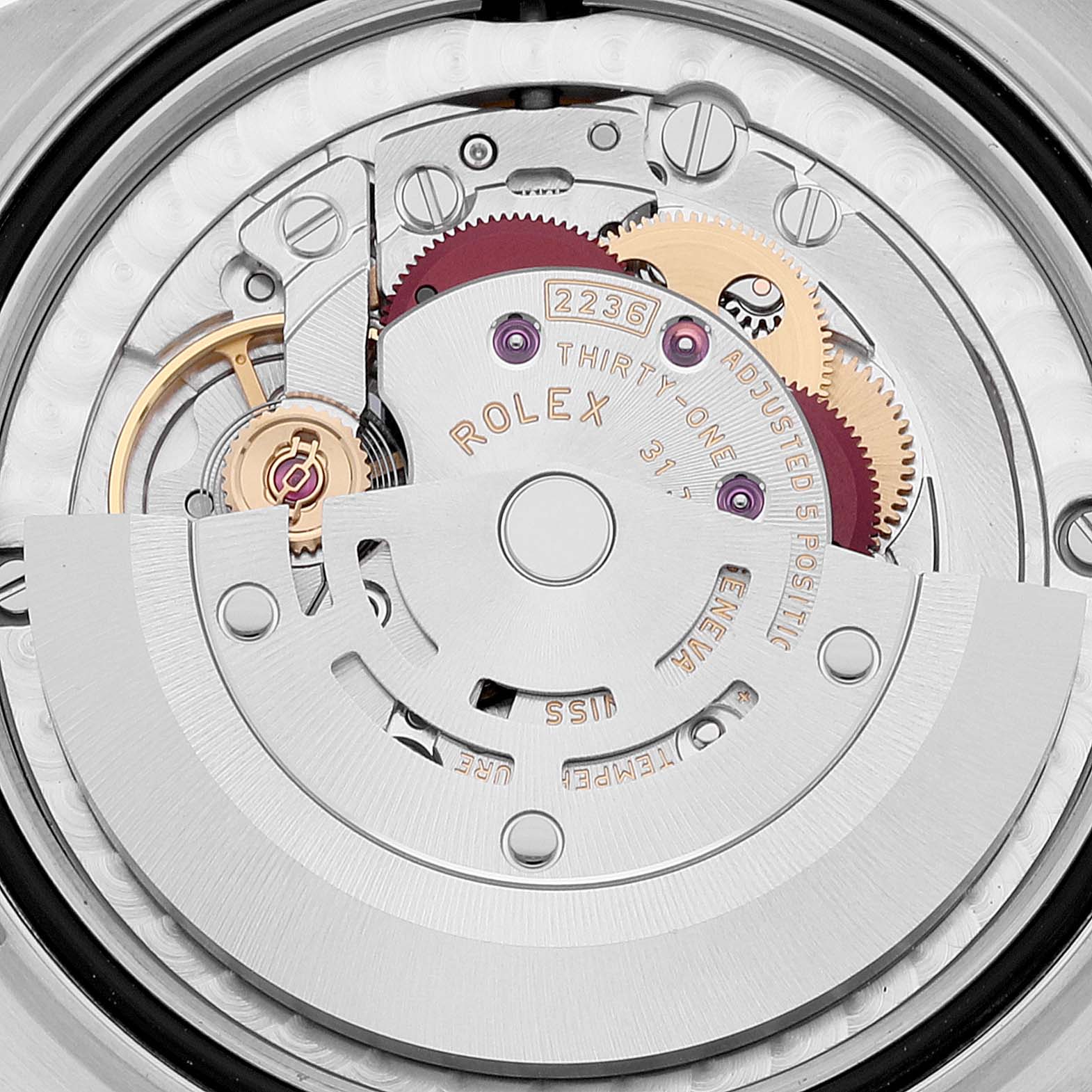 The image shows a close-up view of the movement mechanism inside a Rolex Mid-Size 278274 Women's Stainless Steel Green Dial 278274 Women's Stainless Steel Green Dial model watch.