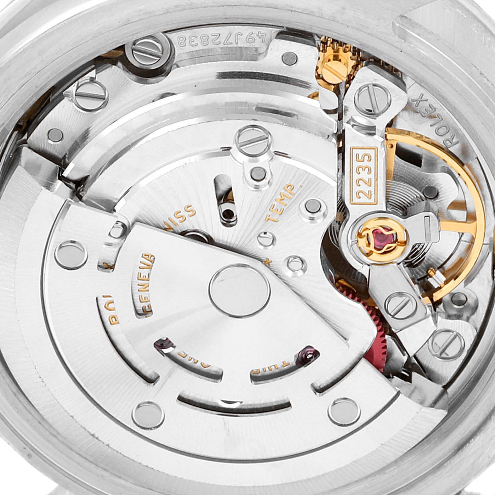 This close-up view of a Rolex Datejust 179174 Women's Stainless Steel Pink Dial 179174 Women's Stainless Steel Pink Dial model shows the intricate parts of its automatic movement mechanism.