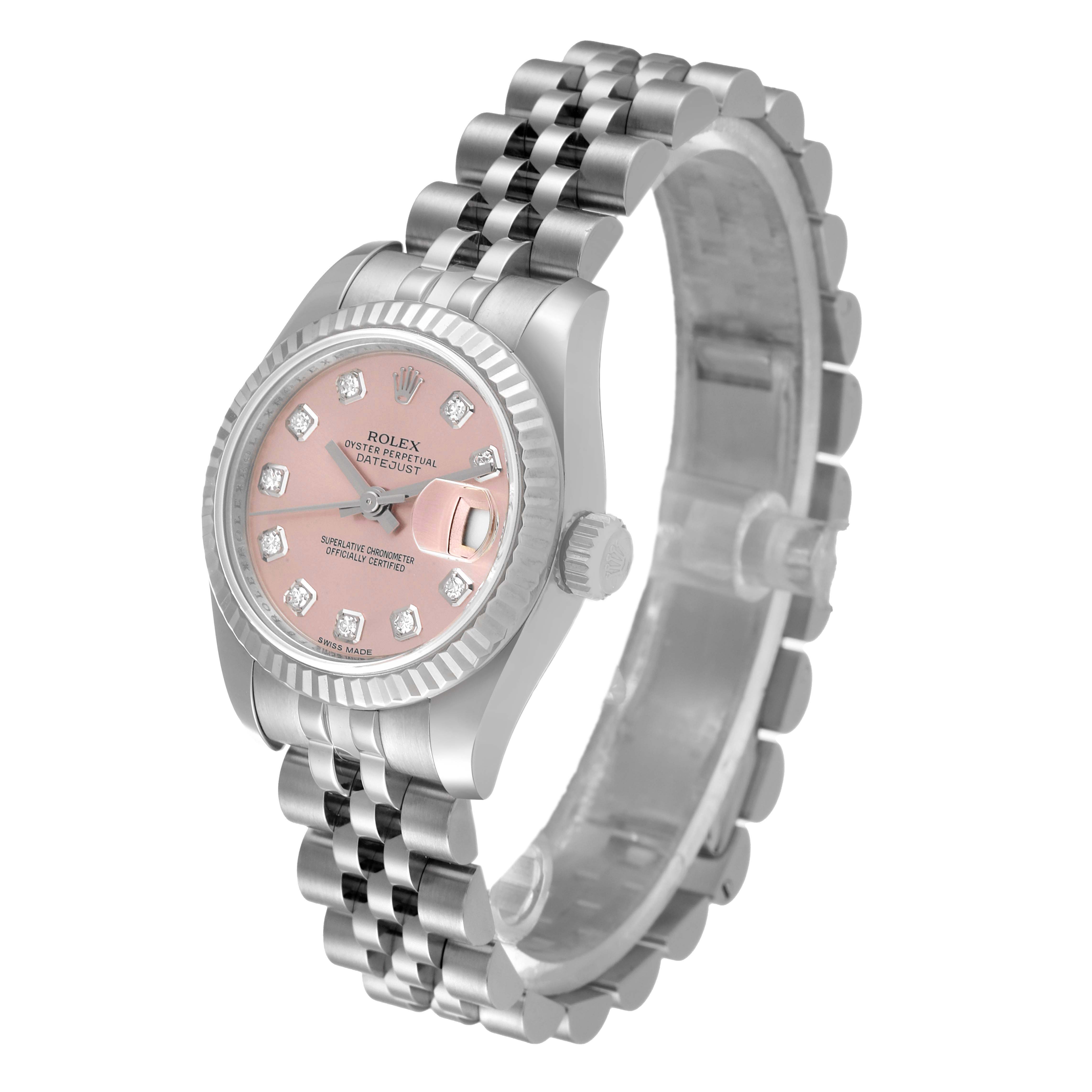 The image shows a Rolex Datejust 179174 Women's Stainless Steel Pink Dial 179174 Women's Stainless Steel Pink Dial, angled from the top front, highlighting its pink dial, diamond hour markers, and Jubilee bracelet.