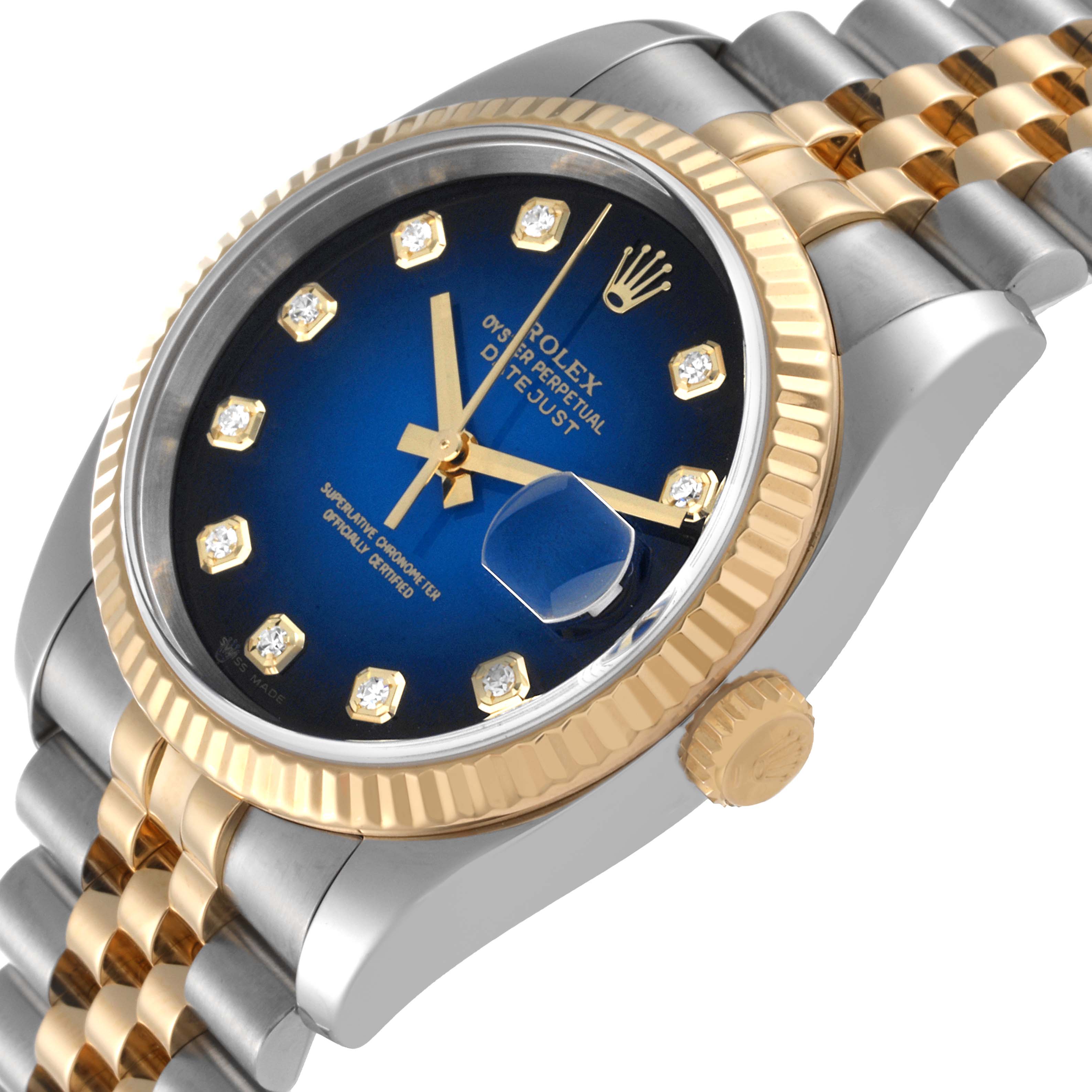 This image shows a Rolex Datejust 116233 Men's Steel and Gold (two tone) Blue Dial 116233 Men's Steel and Gold (two tone) Blue Dial watch at an angled close-up, highlighting the dial, bezel, crown, and part of the bracelet.