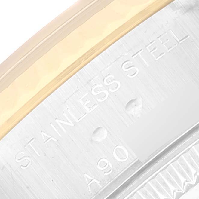 The image shows a close-up of the stainless steel case back with engravings of a Rolex Datejust 79173 Women's Steel and Gold (two tone) Champagne Dial 79173 Women's Steel and Gold (two tone) Champagne Dial watch.