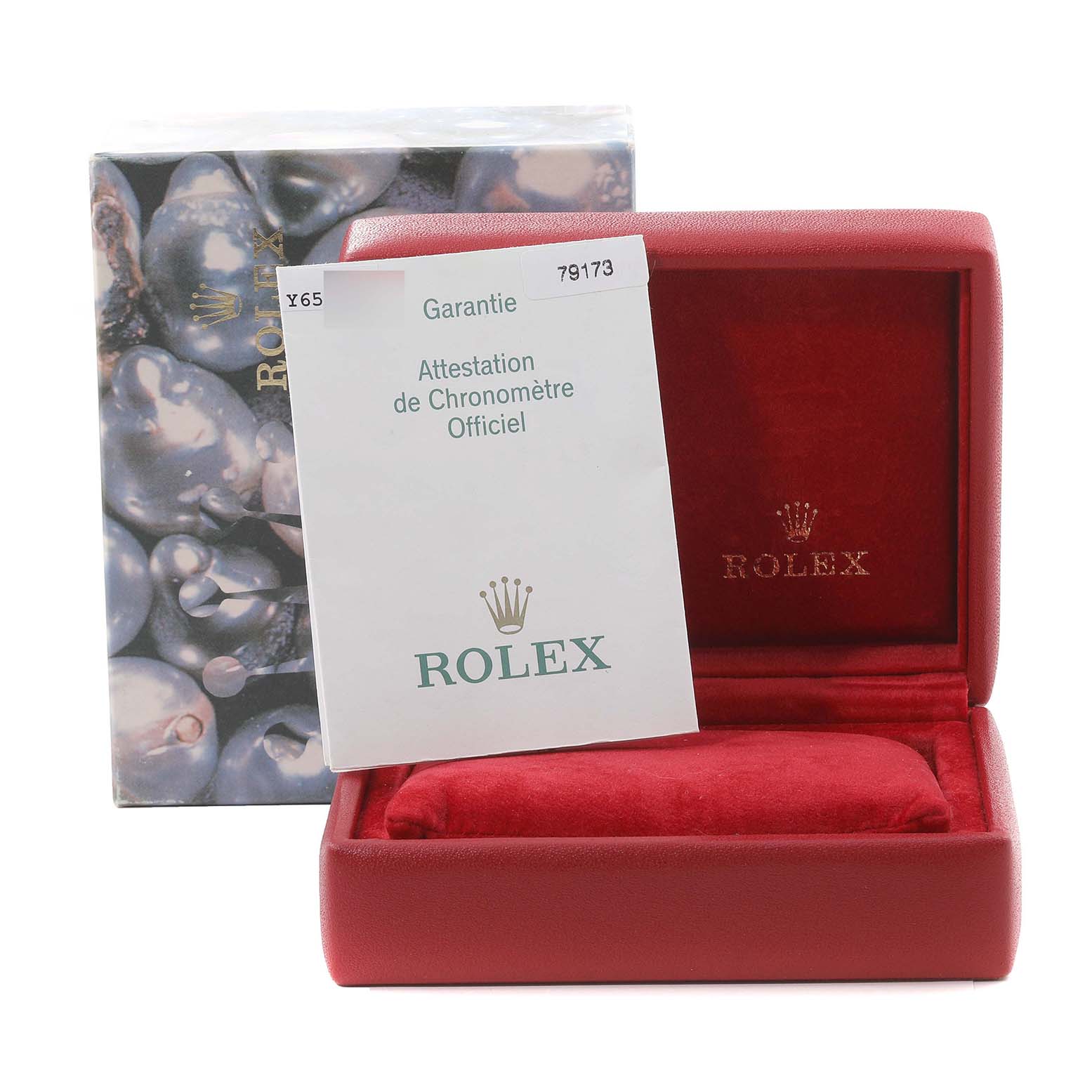 The image shows the packaging and accessories of a Rolex Datejust 79173 Women's Steel and Gold (two tone) Silver Dial 79173 Women's Steel and Gold (two tone) Silver Dial, featuring a red box and official warranty card with the Rolex logo.