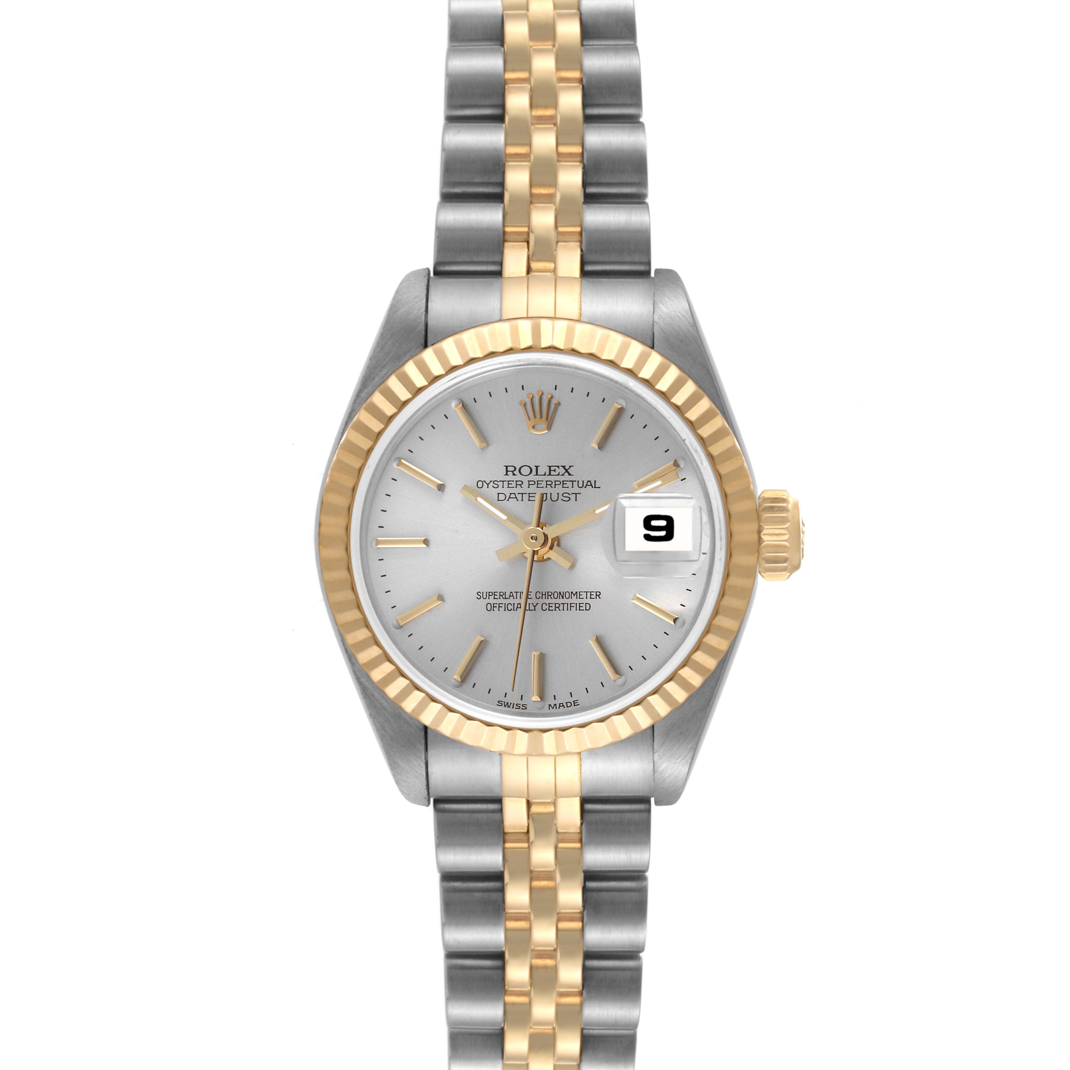 The image depicts a Rolex Datejust 79173 Women's Steel and Gold (two tone) Silver Dial 79173 Women's Steel and Gold (two tone) Silver Dial watch from a top-down angle, showcasing its dial, bezel, bracelet, and crown.