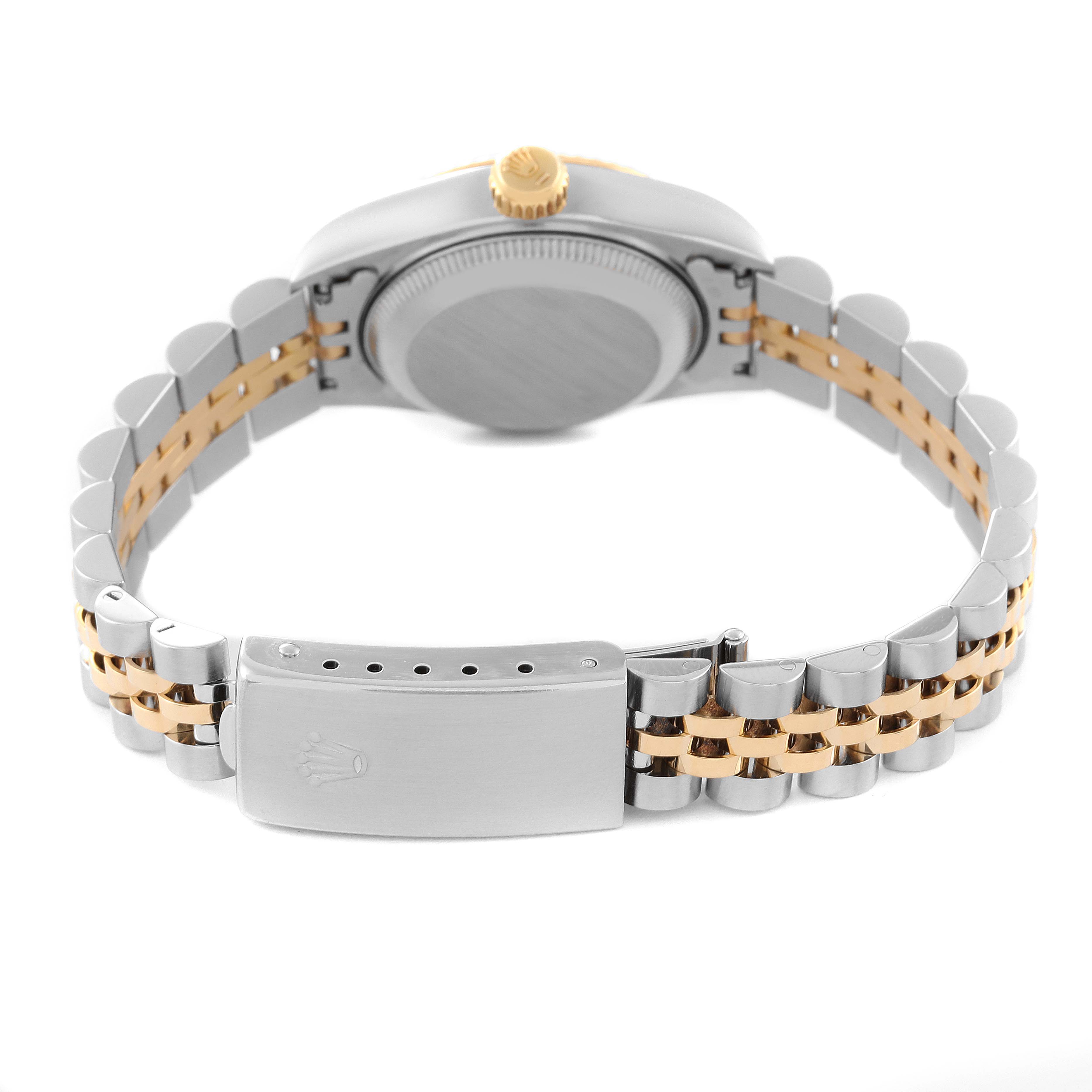 This is the back view of a Rolex Datejust 69173 Women's Stainless Steel White Dial 69173 Women's Stainless Steel White Dial watch, showing the case back, crown, and two-tone bracelet with a clasp.