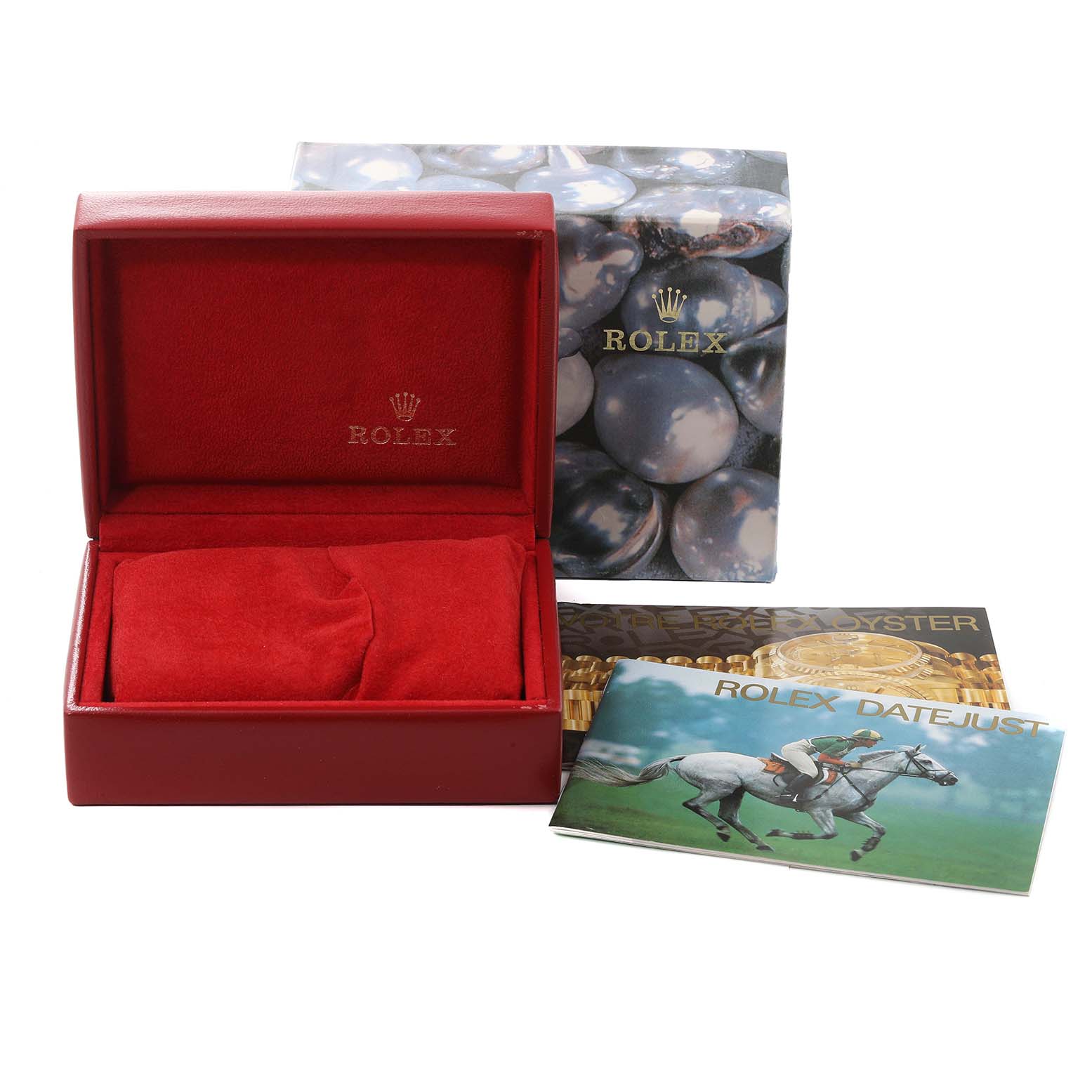 This image features a Rolex Datejust 79173 Women's Steel and Gold (two tone) White Dial 79173 Women's Steel and Gold (two tone) White Dial box, with a red interior, along with booklets and the outer packaging.