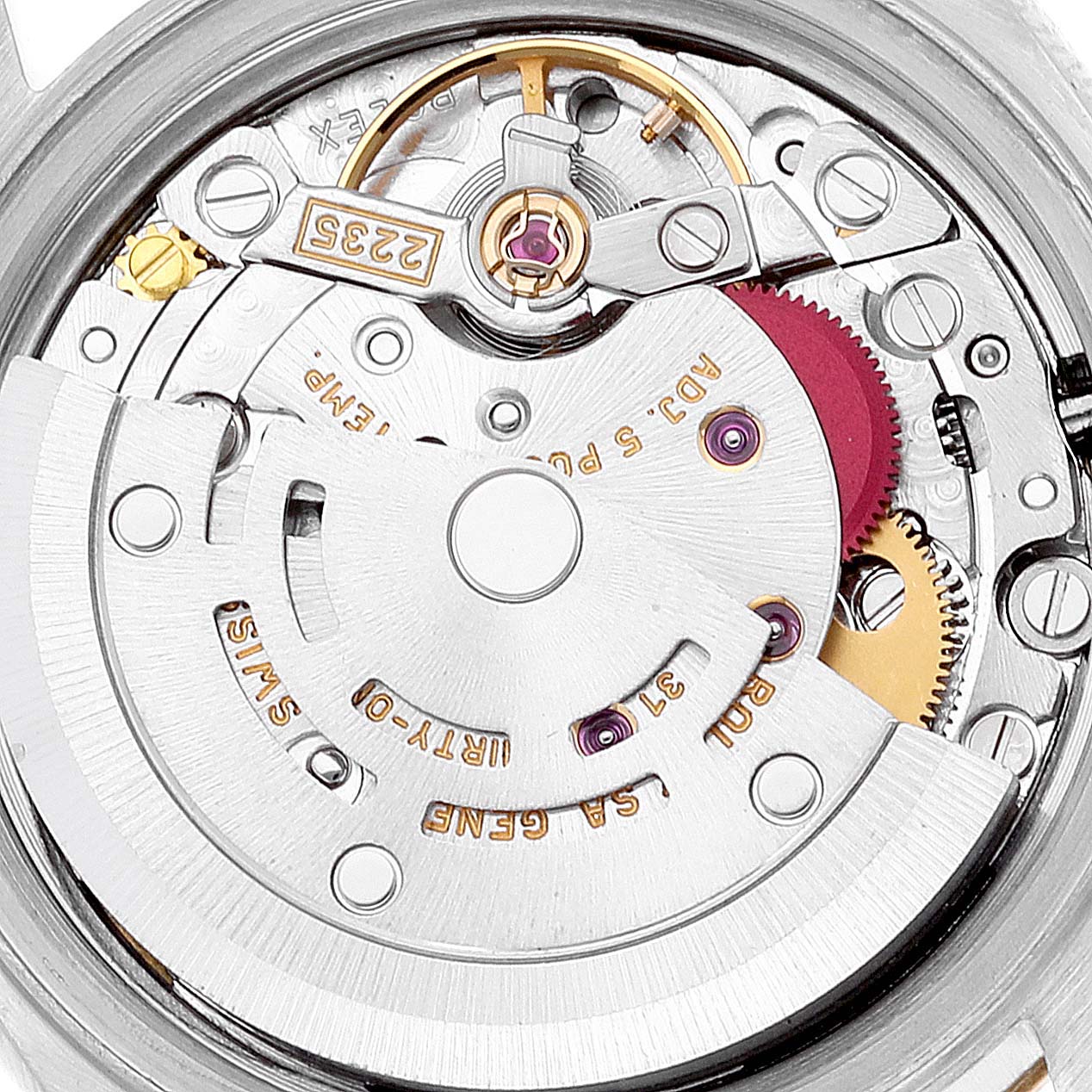 This image shows the internal mechanism of a Rolex Datejust 79173 Women's Steel and Gold (two tone) White Dial 79173 Women's Steel and Gold (two tone) White Dial, highlighting components like the rotor, gears, and screws.