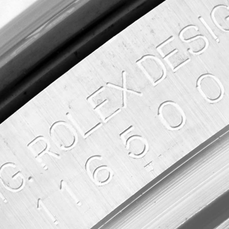 This close-up image shows the engraved serial number and "Rolex Design" on the side of the Daytona model by Rolex.
