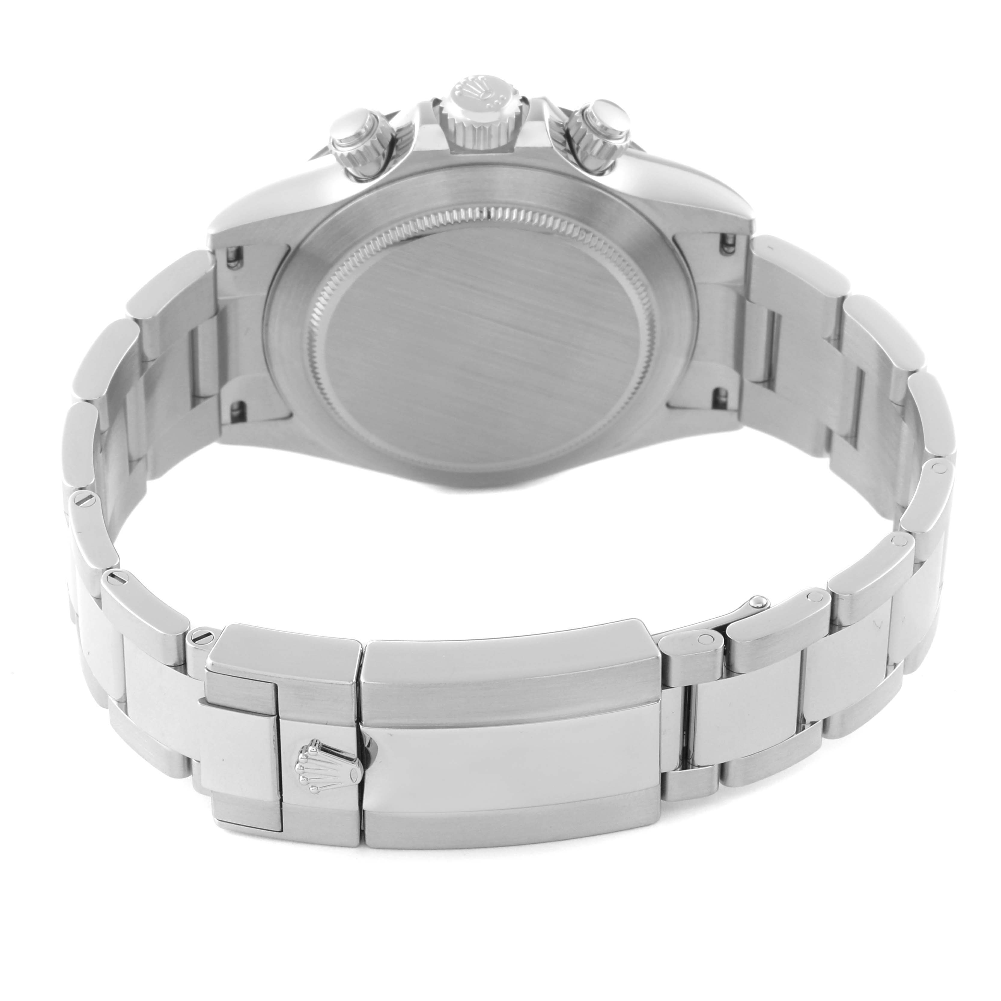 This image shows the back case, crown, and bracelet clasp of a Rolex Daytona 116500 Men's Stainless Steel White Dial 116500 Men's Stainless Steel White Dial model watch.