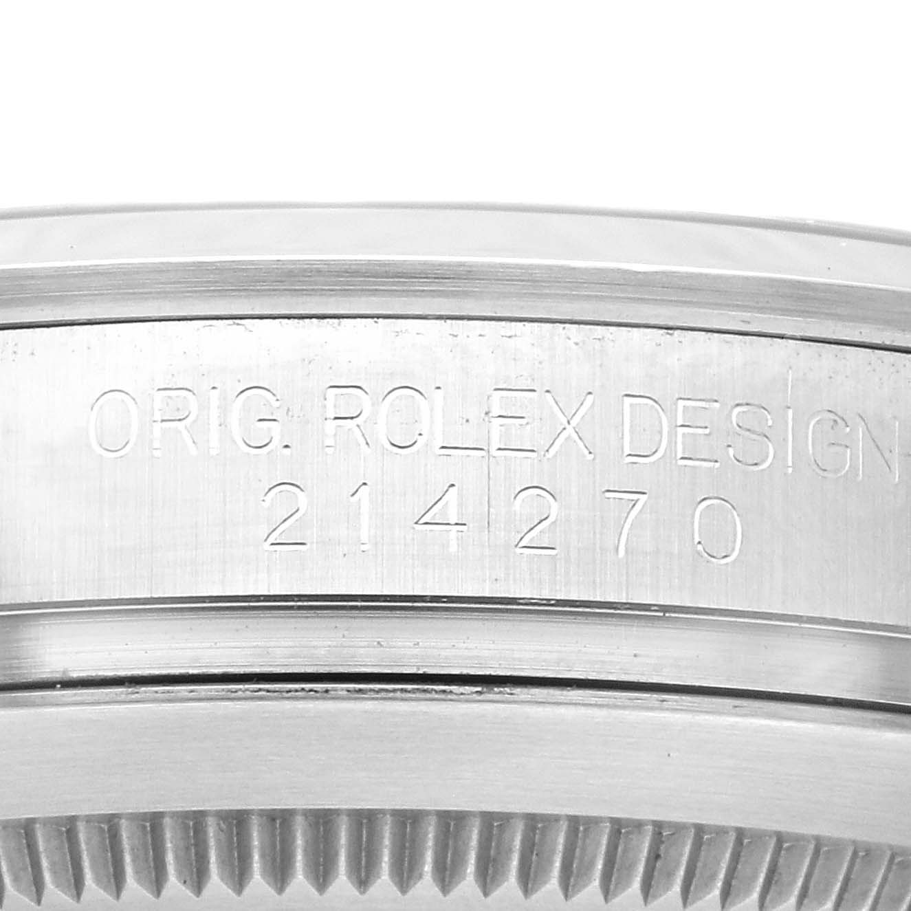 This close-up image shows the engraved side view of a Rolex Explorer 214270 Men
s Stainless Steel Black Dial 214270 Men
s Stainless Steel Black Dial model, displaying "ORIG. ROLEX DESIGN 214270."