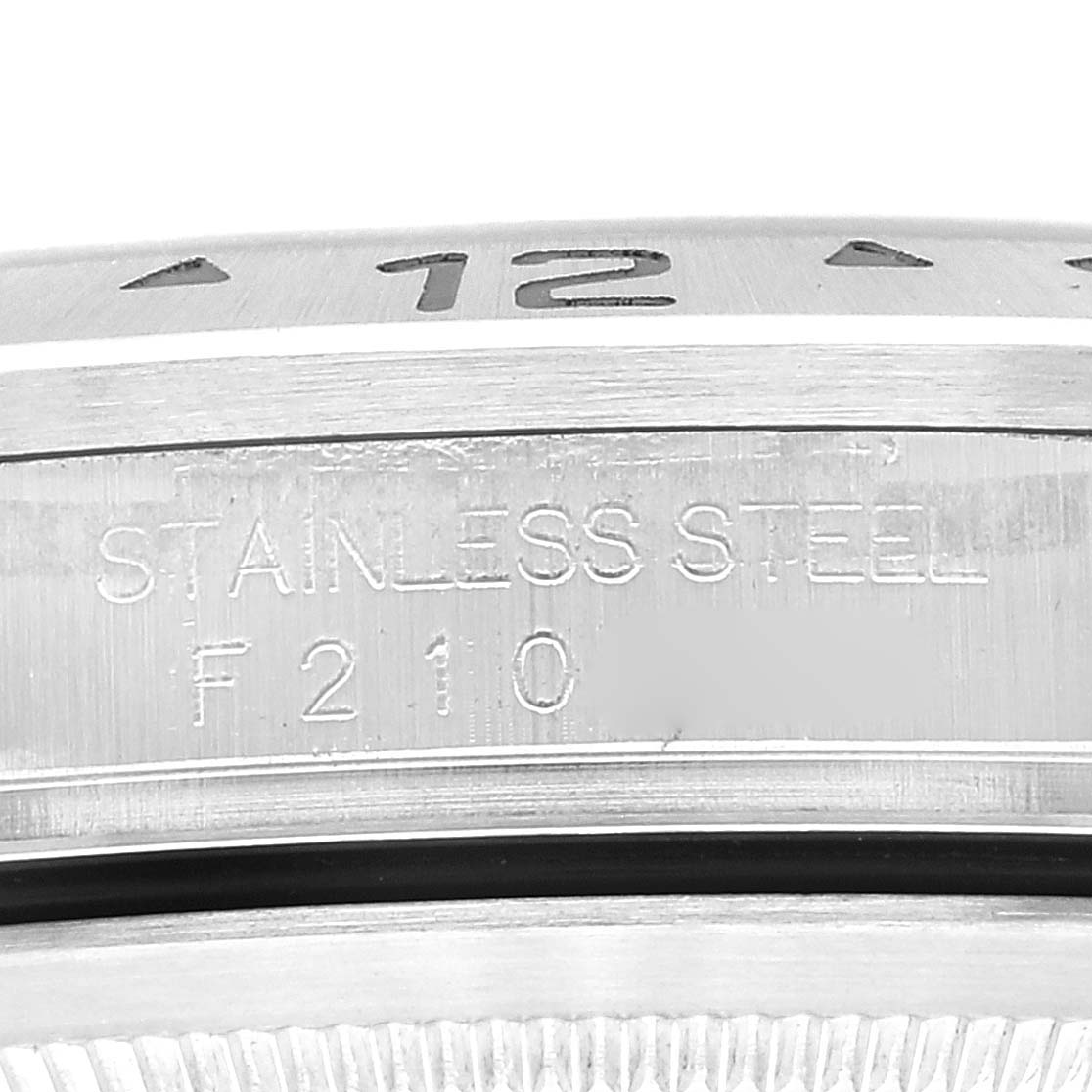 This close-up angle shows the side of the bezel and casing of the Rolex Explorer 16570 Men
s Stainless Steel Black Dial 16570 Men
s Stainless Steel Black Dial watch, displaying the stainless steel material and engraving.