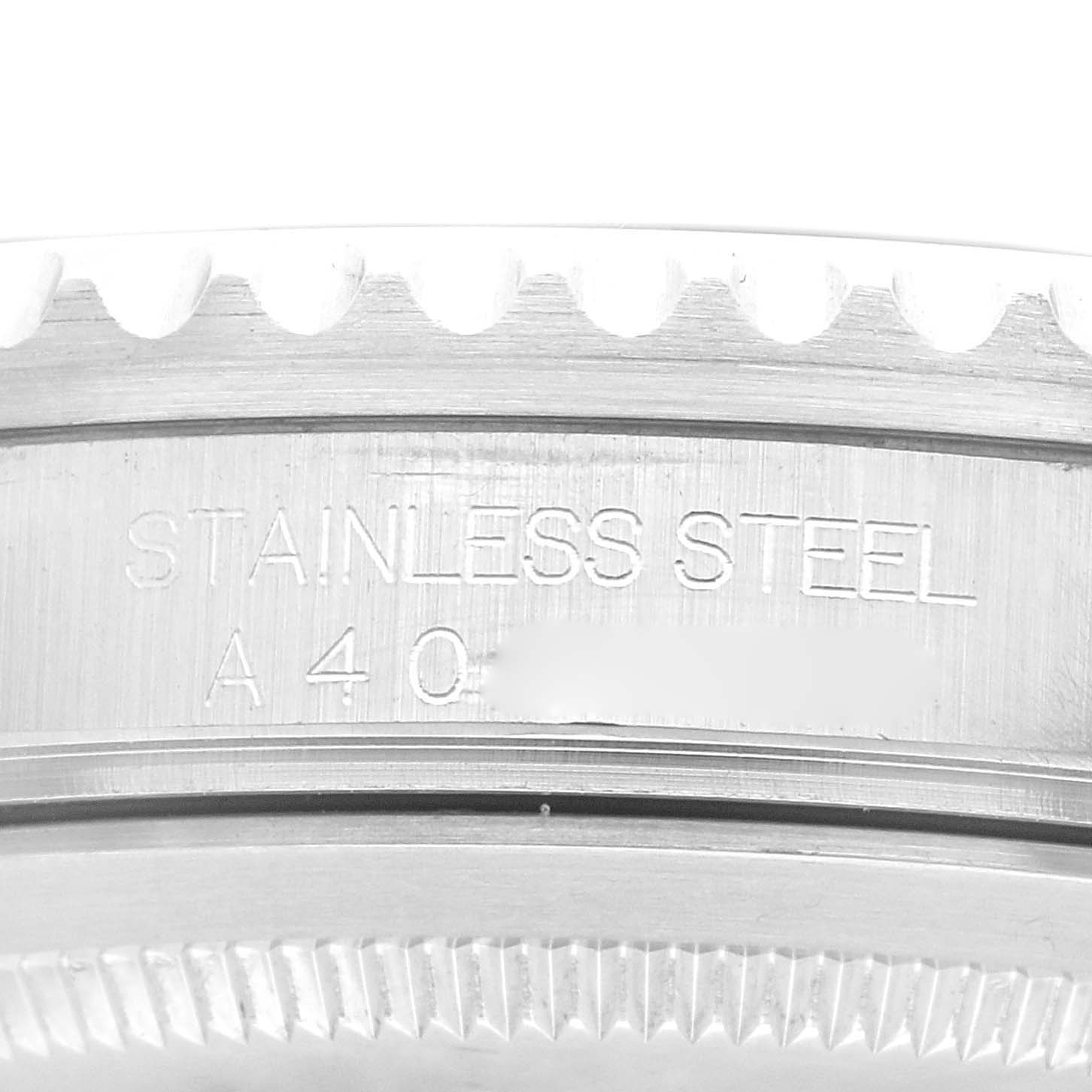 Close-up of the case back edge and side inscription of a Rolex GMT-Master 16700 Men's Stainless Steel Black Dial 16700 Men's Stainless Steel Black Dial watch, showing the "STAINLESS STEEL" engraving.