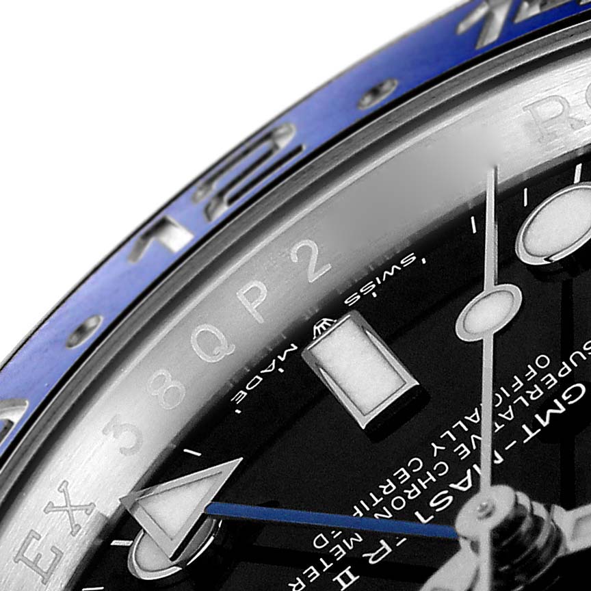 The image shows a close-up of the bezel, dial, and hands of the Rolex GMT-Master 126710 Men
s Stainless Steel Black Dial 126710 Men
s Stainless Steel Black Dial watch model.
