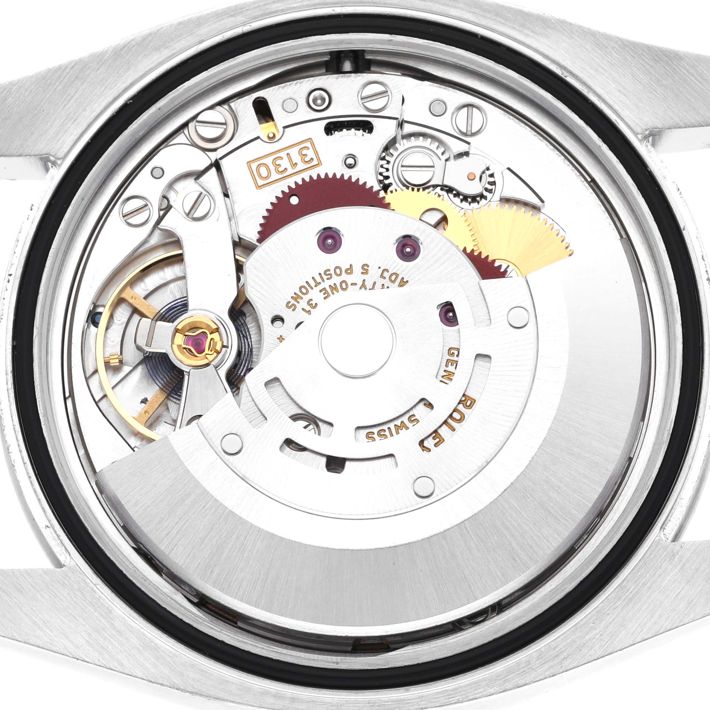 This image shows the internal mechanical movement of a Rolex Oyster Perpetual 116000 Men's Stainless Steel Champagne Dial 116000 Men's Stainless Steel Champagne Dial watch from a back angle.