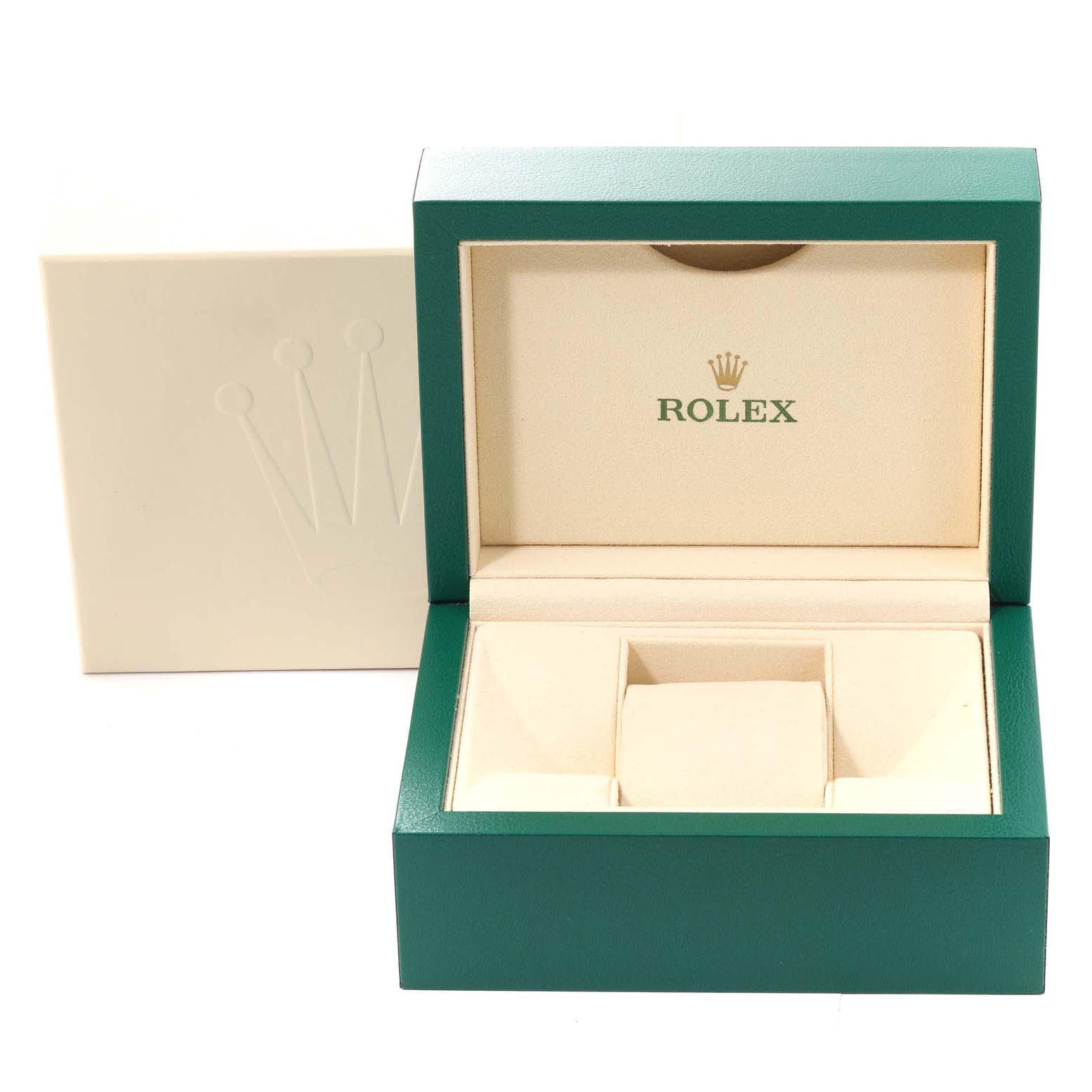 The image shows an open green Rolex watch box for the Oyster Perpetual model, revealing its beige interior.