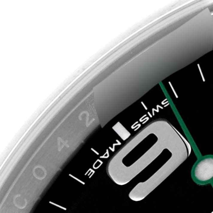 The close-up of the Rolex Air-King 116900 Men's Stainless Steel Black Dial 116900 Men's Stainless Steel Black Dial watch shows part of the dial with the number 9 and the "SWISS MADE" text.