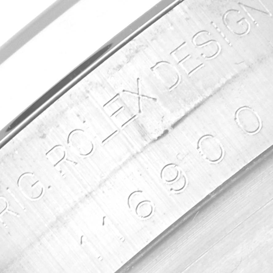 This is a close-up of the engraved design details on the inner bezel of the Rolex Air-King 116900 Men's Stainless Steel Black Dial 116900 Men's Stainless Steel Black Dial watch.