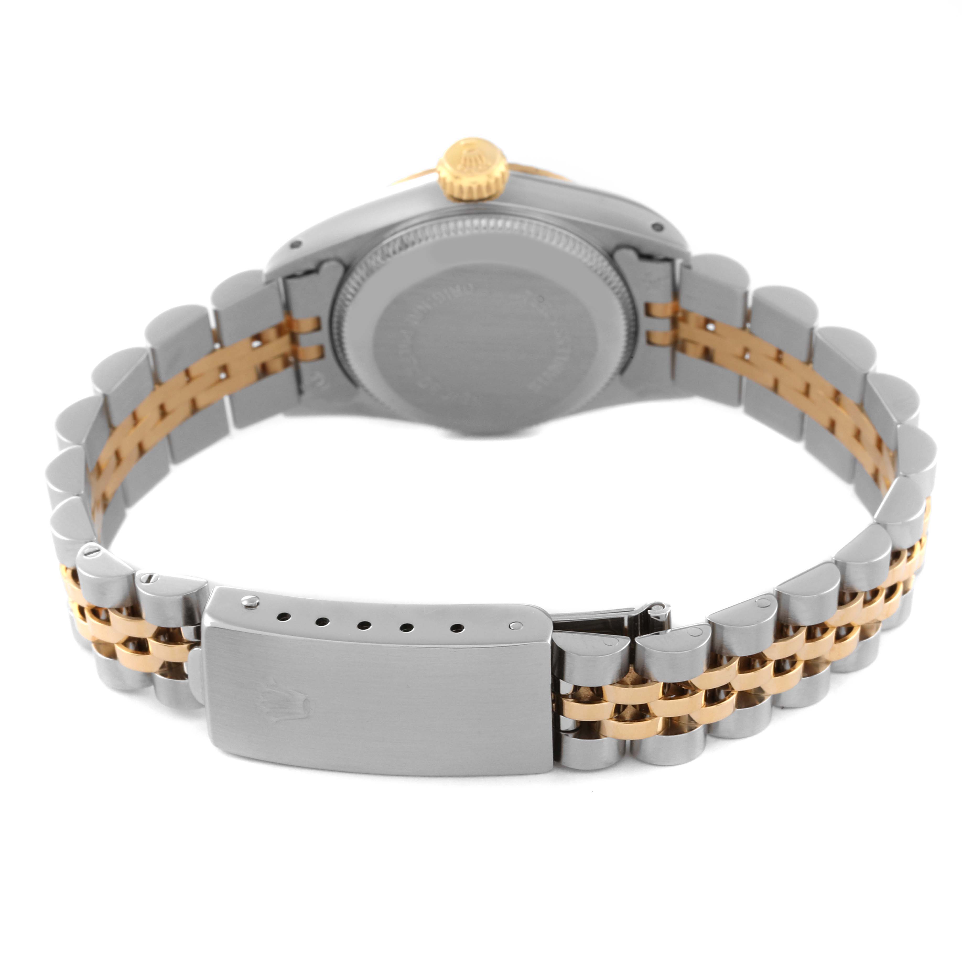 This image shows the back view of a Rolex Oyster Perpetual 67193 Women's Steel and Gold (two tone) Blue Dial 67193 Women's Steel and Gold (two tone) Blue Dial watch, focusing on the case back and two-tone bracelet.