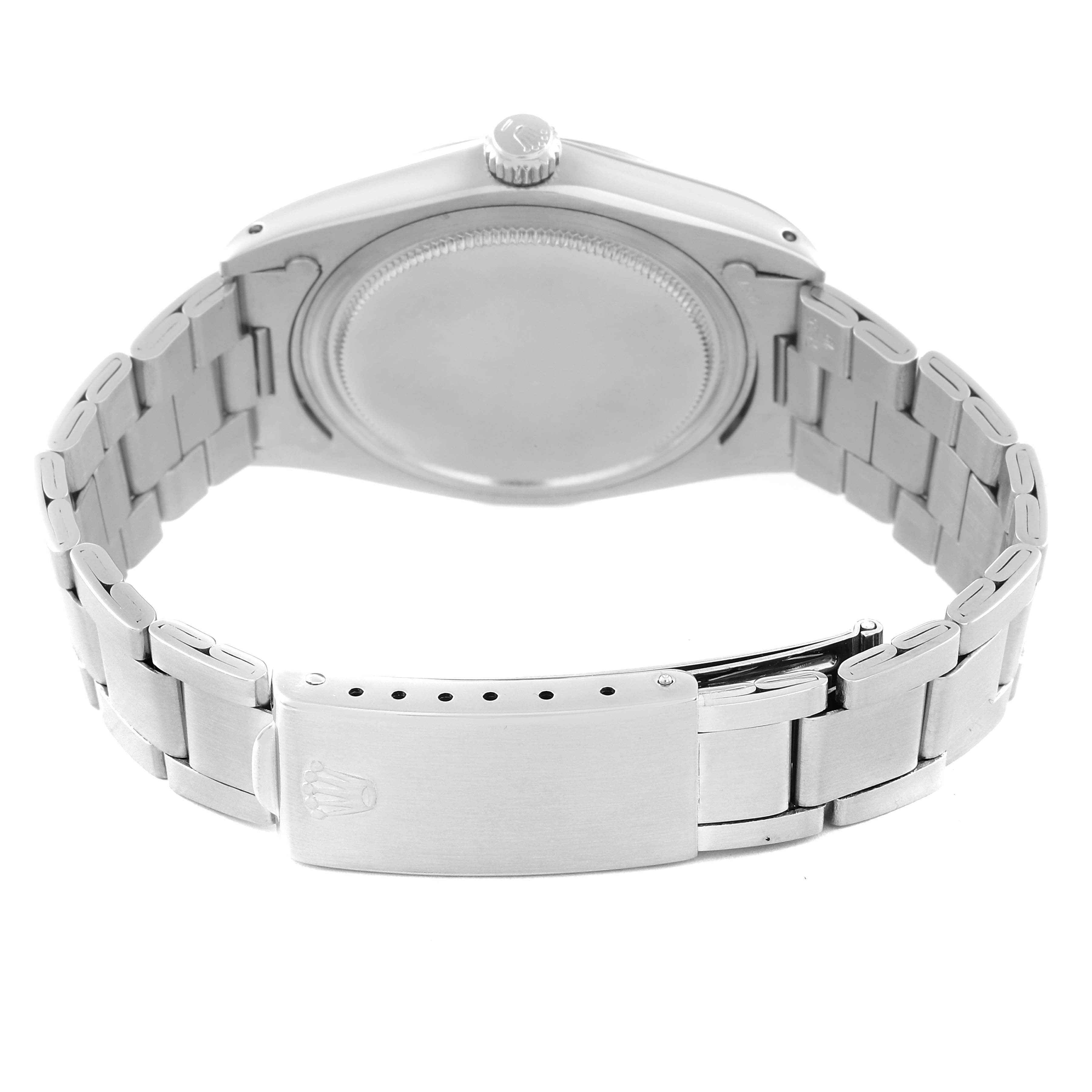 The image shows the back view of the Vintage Collection model by Rolex, highlighting the case back and clasp.