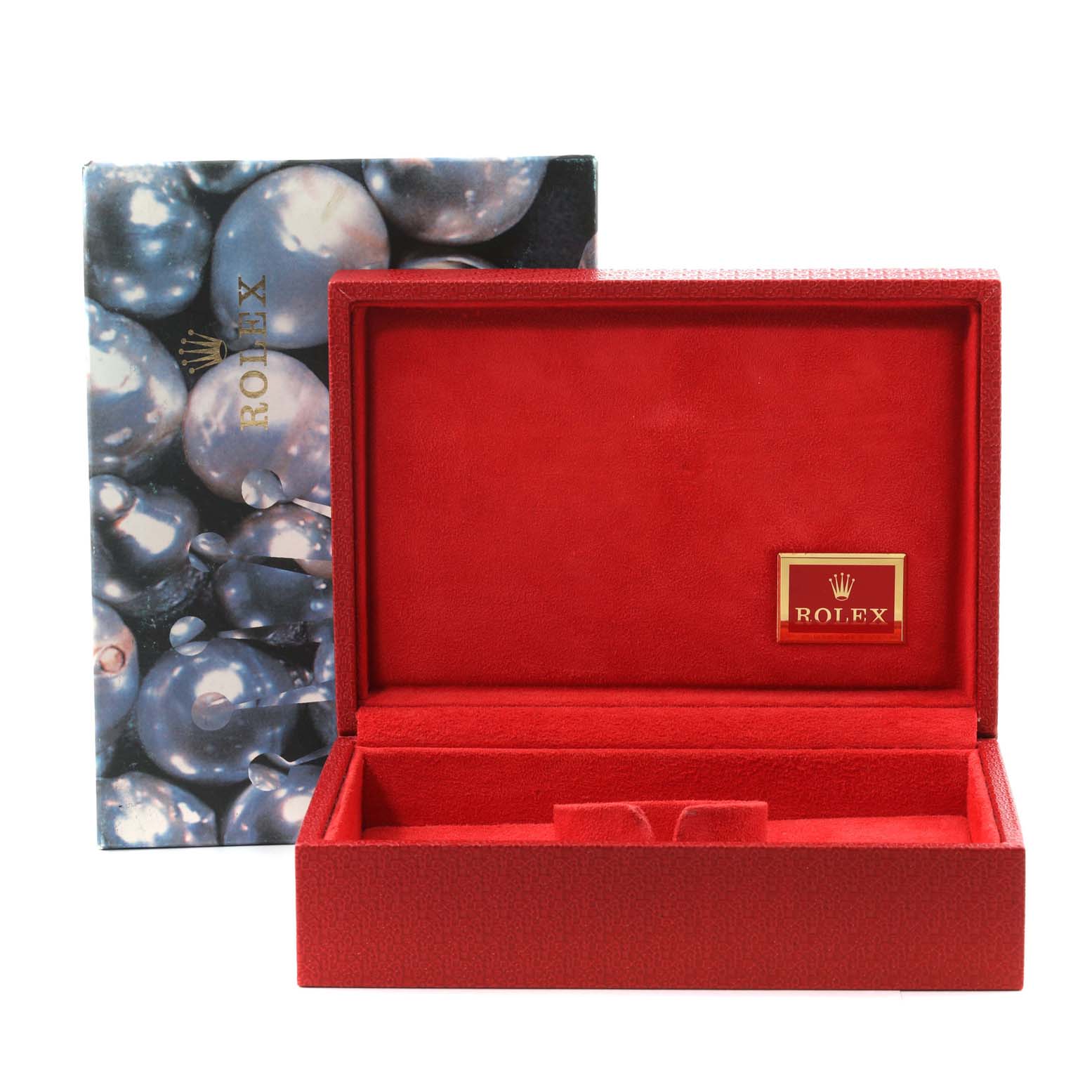 This image shows an open red Rolex watch box, likely for the President model, with the exterior packaging displayed behind it.