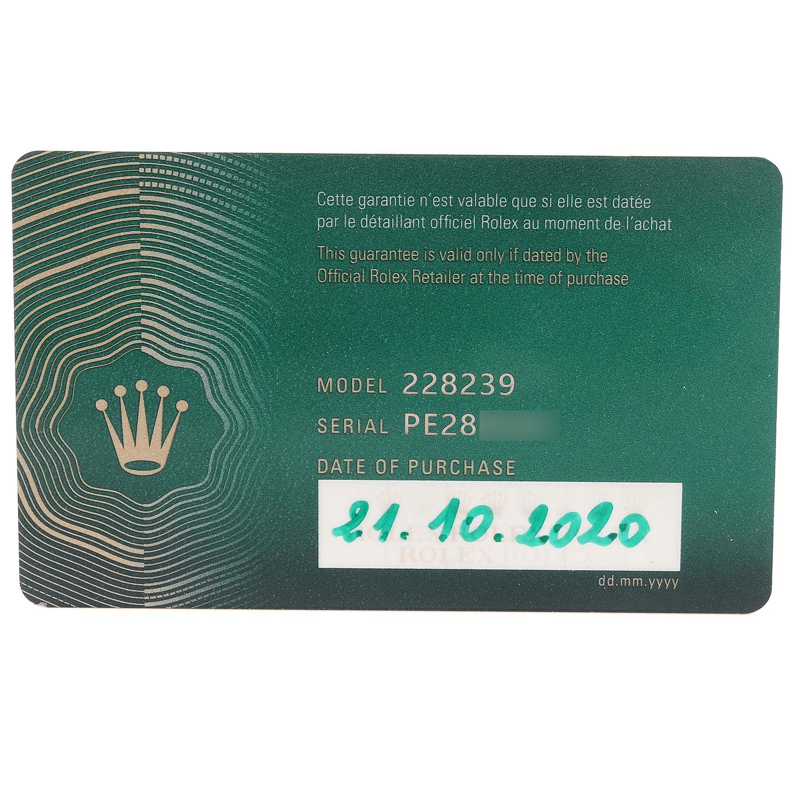 This image shows a guarantee card for a Rolex President 228239 Men's White Gold Blue Dial 228239 Men's White Gold Blue Dial model watch (model 228239) with purchase details and serial number.