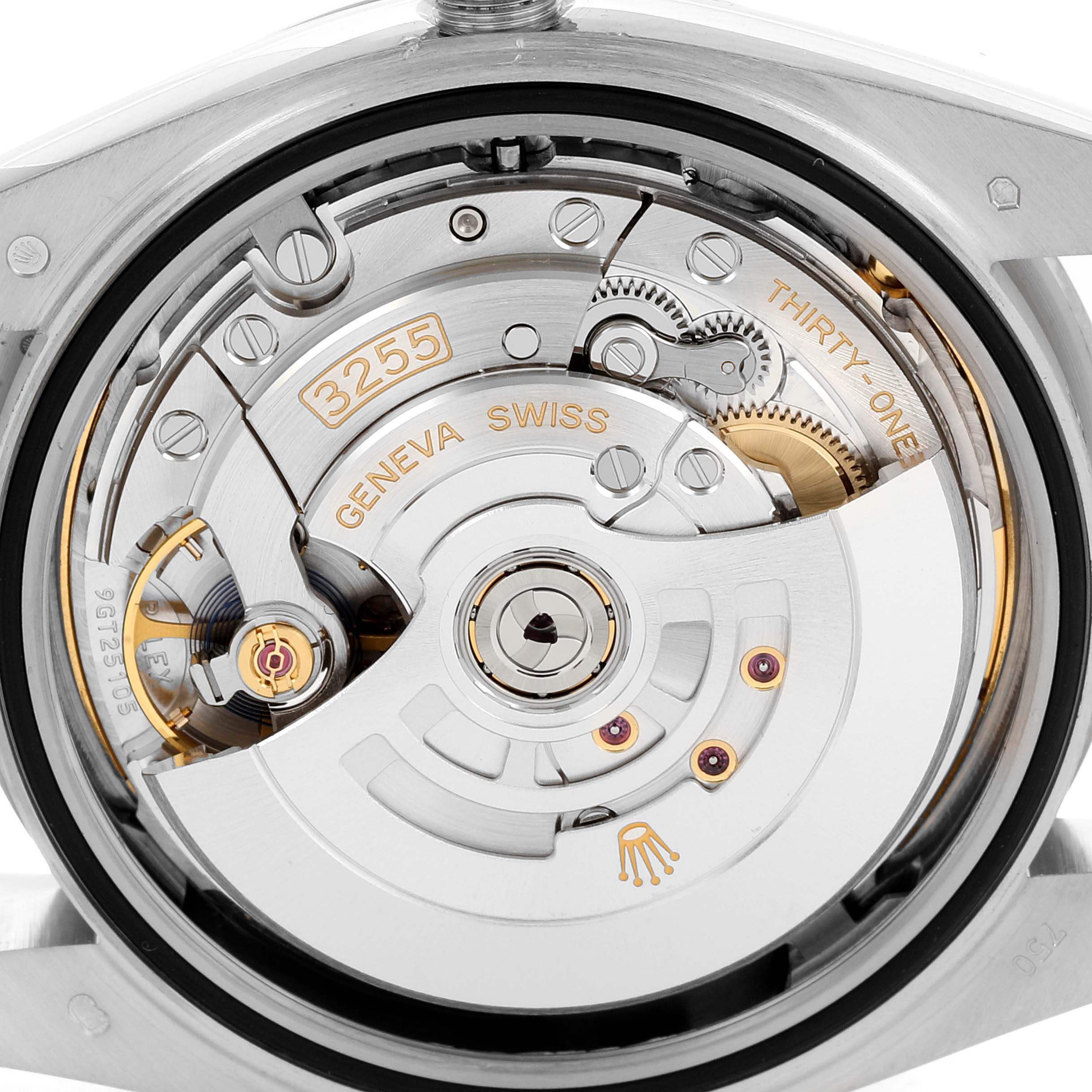The image shows the inner mechanism and movement of a Rolex President 228239 Men's White Gold Blue Dial 228239 Men's White Gold Blue Dial watch from the back angle.