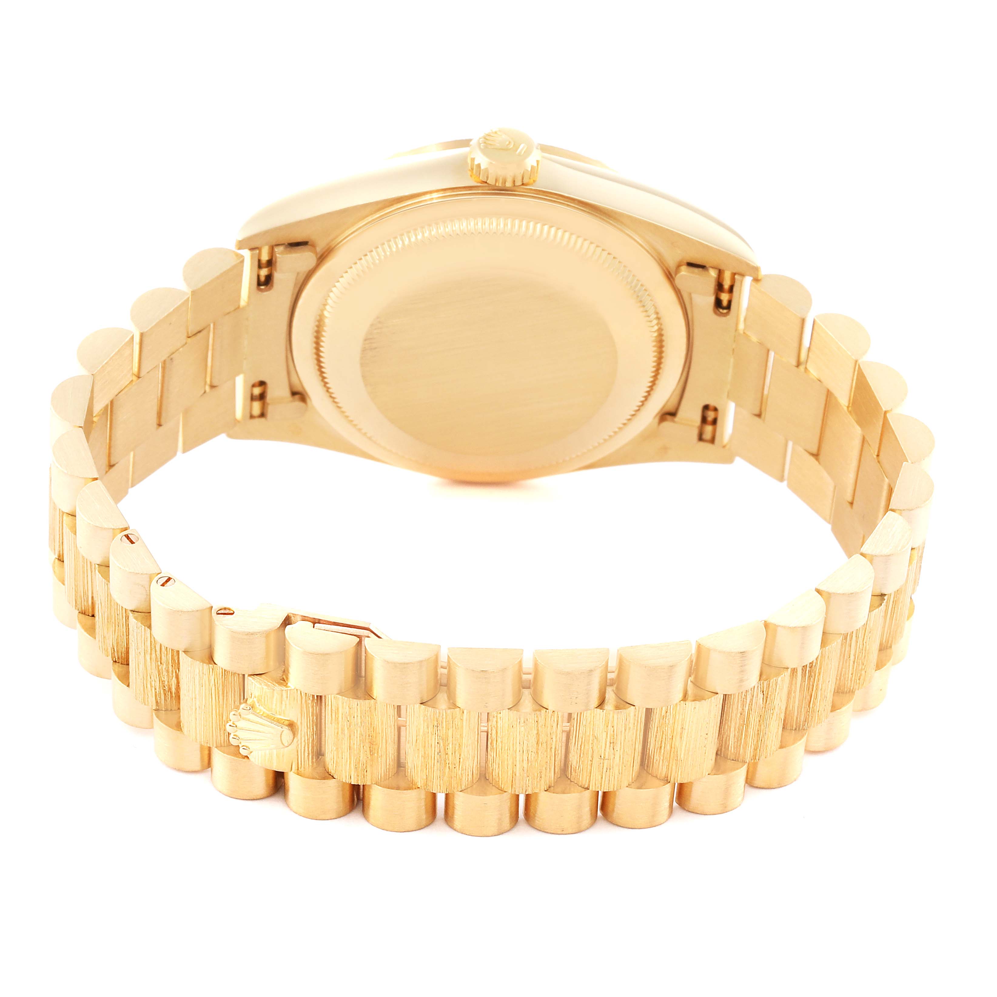 This image shows the underside of the Rolex President 18248 Men
s Yellow Gold Champagne Dial 18248 Men
s Yellow Gold Champagne Dial model watch case and bracelet, highlighting the clasp and crown.