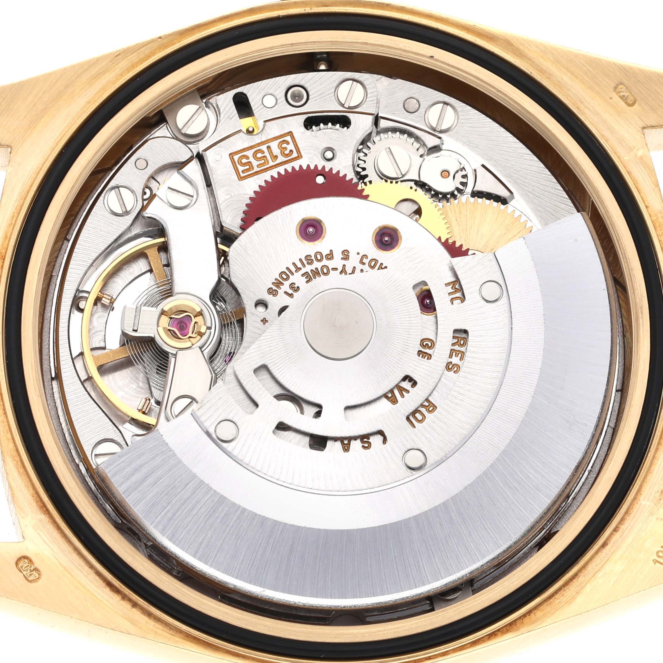 This image shows the intricate internal mechanism of a Rolex President 18238 Men
s Yellow Gold Champagne Dial 18238 Men
s Yellow Gold Champagne Dial model watch from a top-down angle.