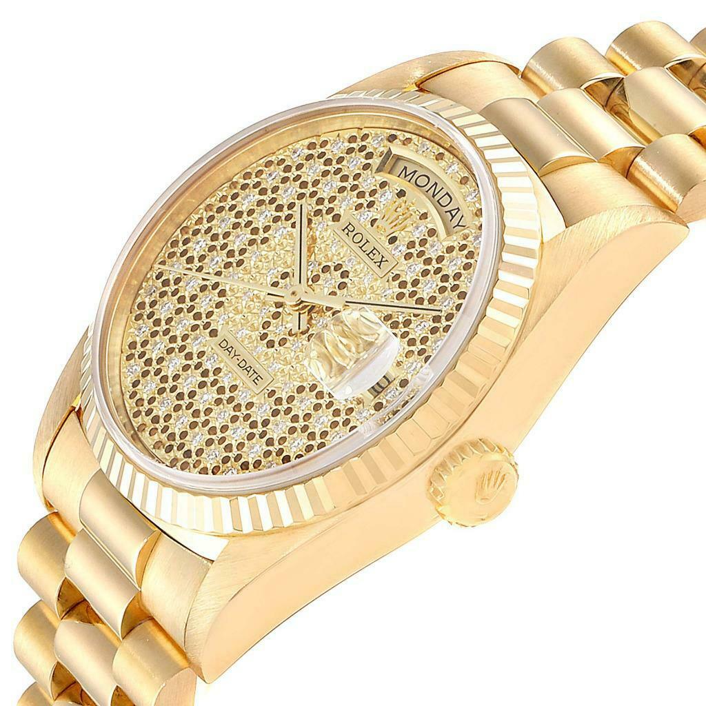 This image shows a side angle of a Rolex President 18238 Men
s Yellow Gold Champagne Dial 18238 Men
s Yellow Gold Champagne Dial model watch, highlighting the crown, bracelet, and diamond-encrusted dial.