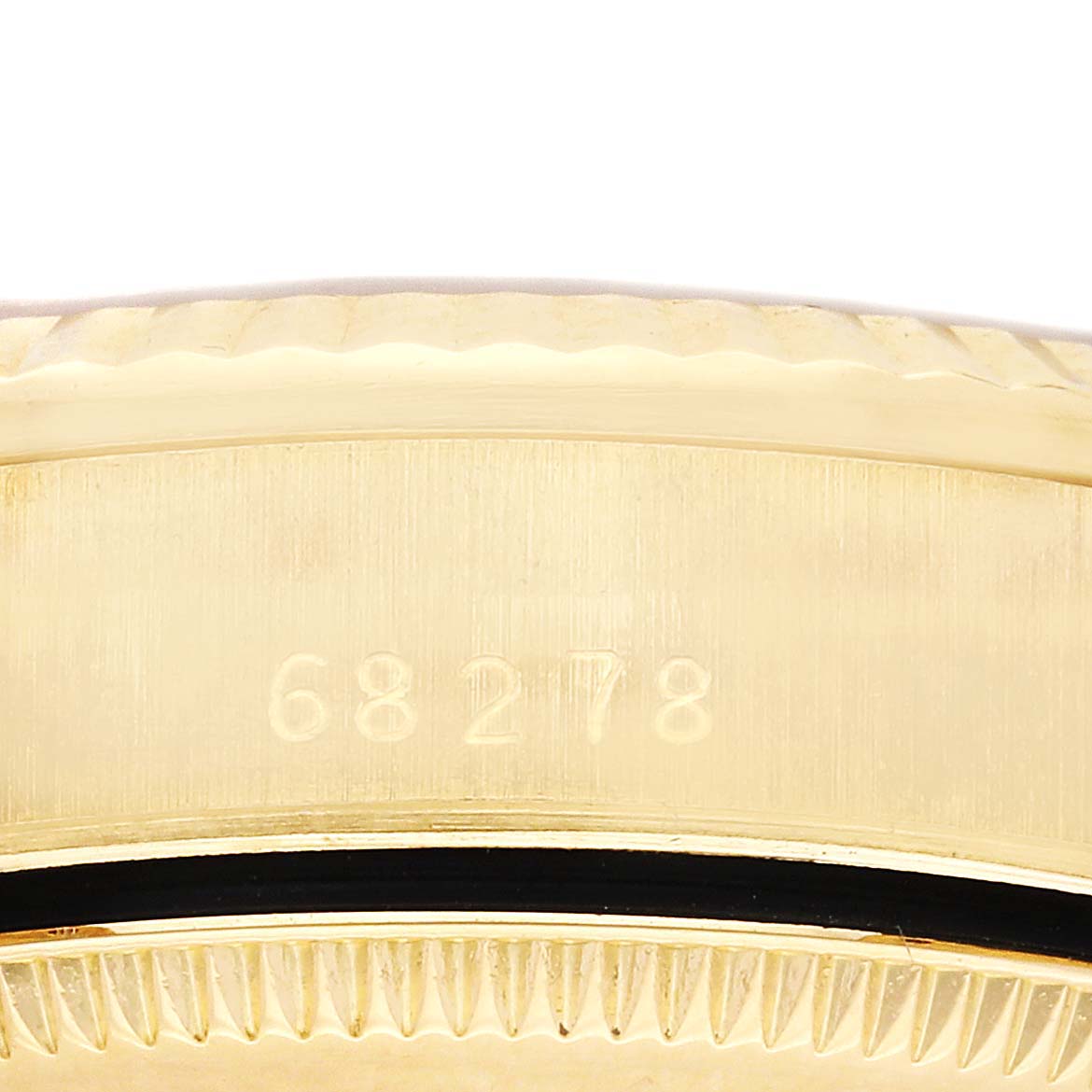 This close-up image of the Rolex President 68278G Women's Yellow Gold Black Dial 68278G Women's Yellow Gold Black Dial model shows the side of the watch case with its engraved reference number.