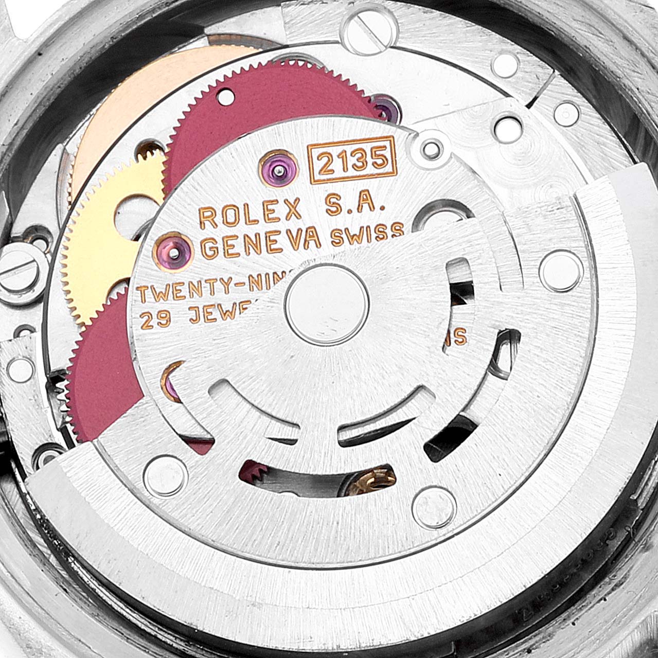 This close-up image shows the internal movement mechanism of the Rolex President 69136 Women's Platinum Silver Dial 69136 Women's Platinum Silver Dial model watch, emphasizing its gears and jewels.