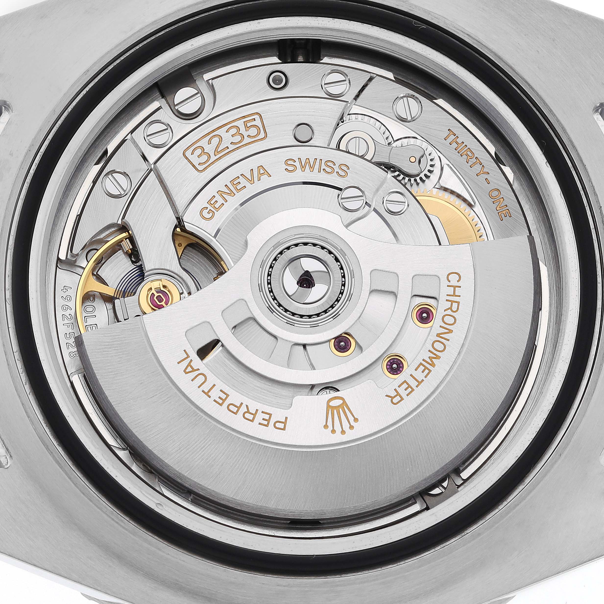 The image shows the intricate inner mechanism and movement of a Rolex Sea-Dweller 126600 Men
s Stainless Steel Black Dial 126600 Men
s Stainless Steel Black Dial watch, viewed from the back.