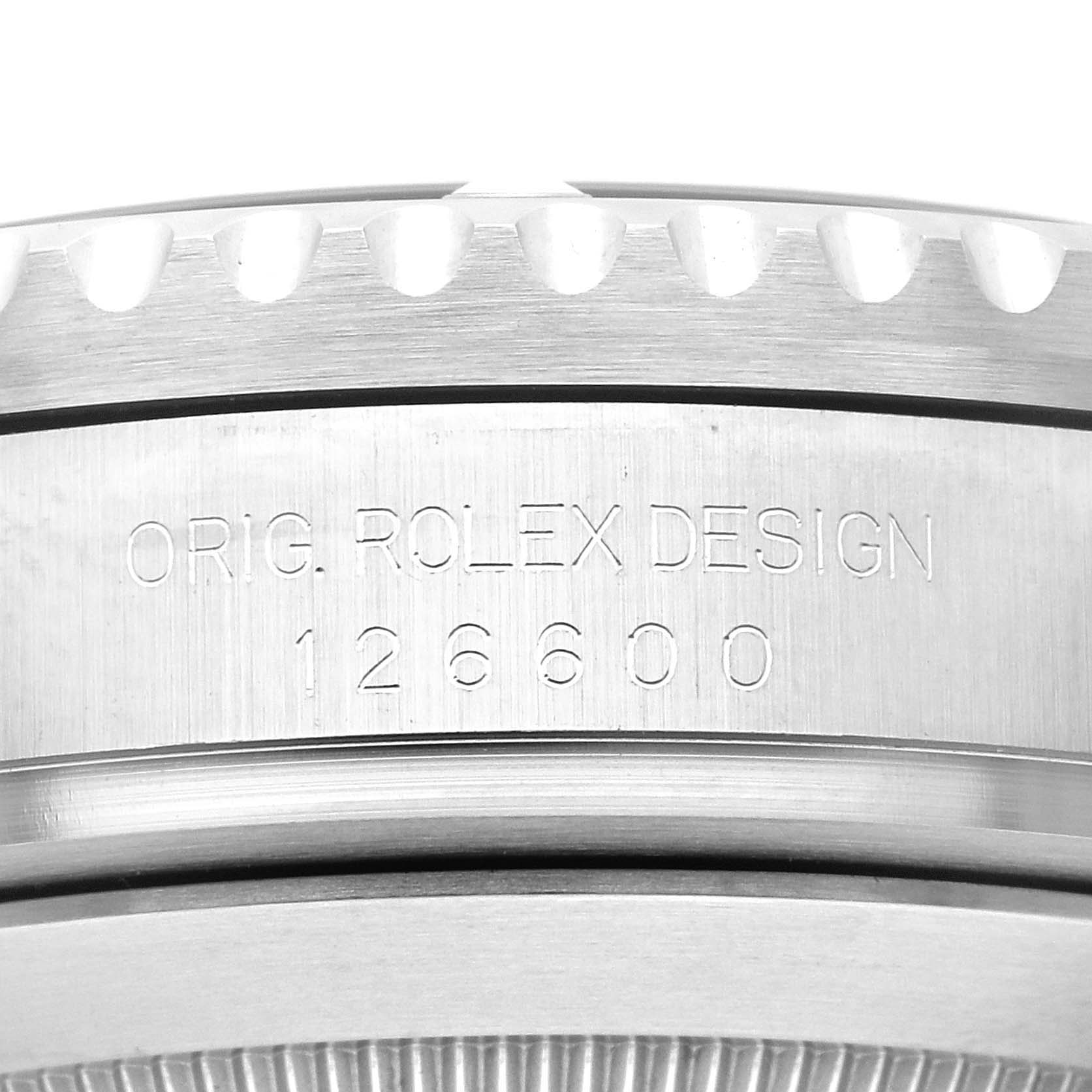 The image shows a close-up of the side of a Rolex Sea-Dweller 126600 Men
s Stainless Steel Black Dial 126600 Men
s Stainless Steel Black Dial watch, highlighting the engraved model number 126600.