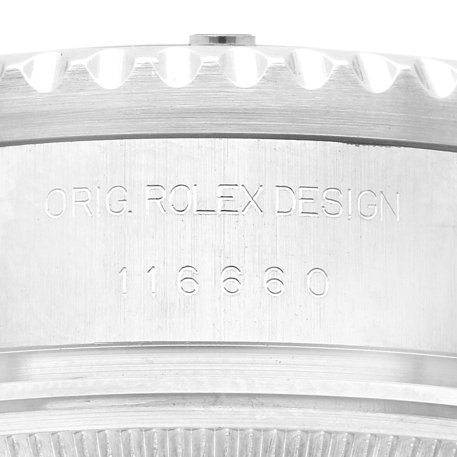 The image shows a close-up of the side engraving "ORIG. ROLEX DESIGN 116660" on a Rolex Sea-Dweller 116660 Men
s Stainless Steel Black Dial 116660 Men
s Stainless Steel Black Dial watch case.