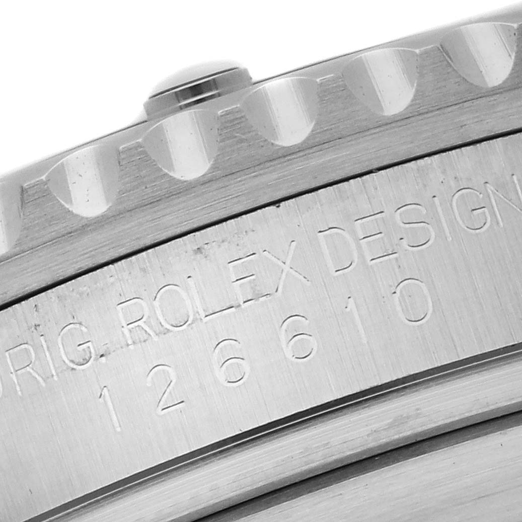 This image shows a close-up of the engraving on the side of a Rolex Submariner 126610 Men
s Stainless Steel Black Dial 126610 Men
s Stainless Steel Black Dial model watch case.
