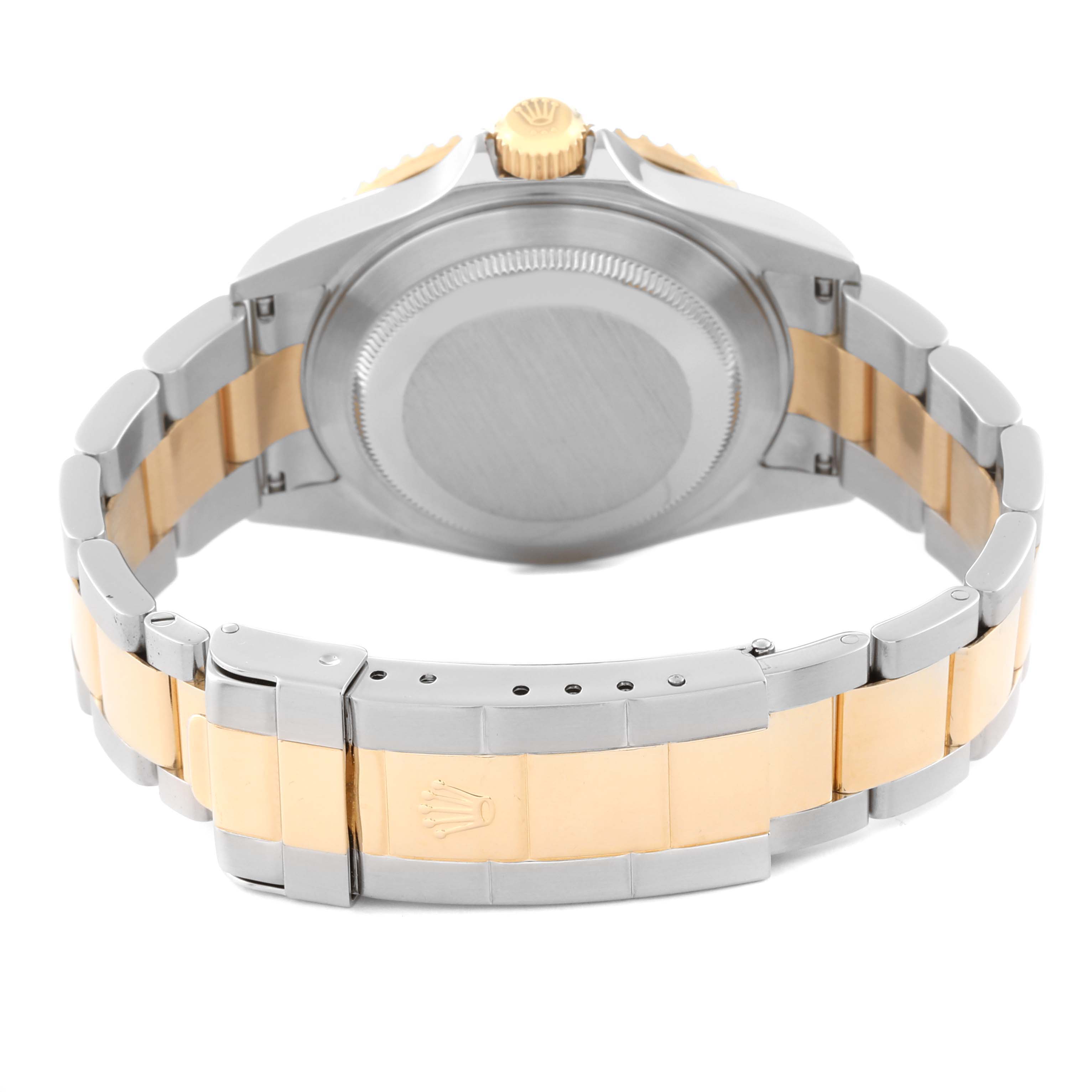 The image shows the back case and bracelet clasp of a Rolex Submariner 16613 Men's Steel and Gold (two tone) Blue Dial 16613 Men's Steel and Gold (two tone) Blue Dial watch, featuring a two-tone metal design.