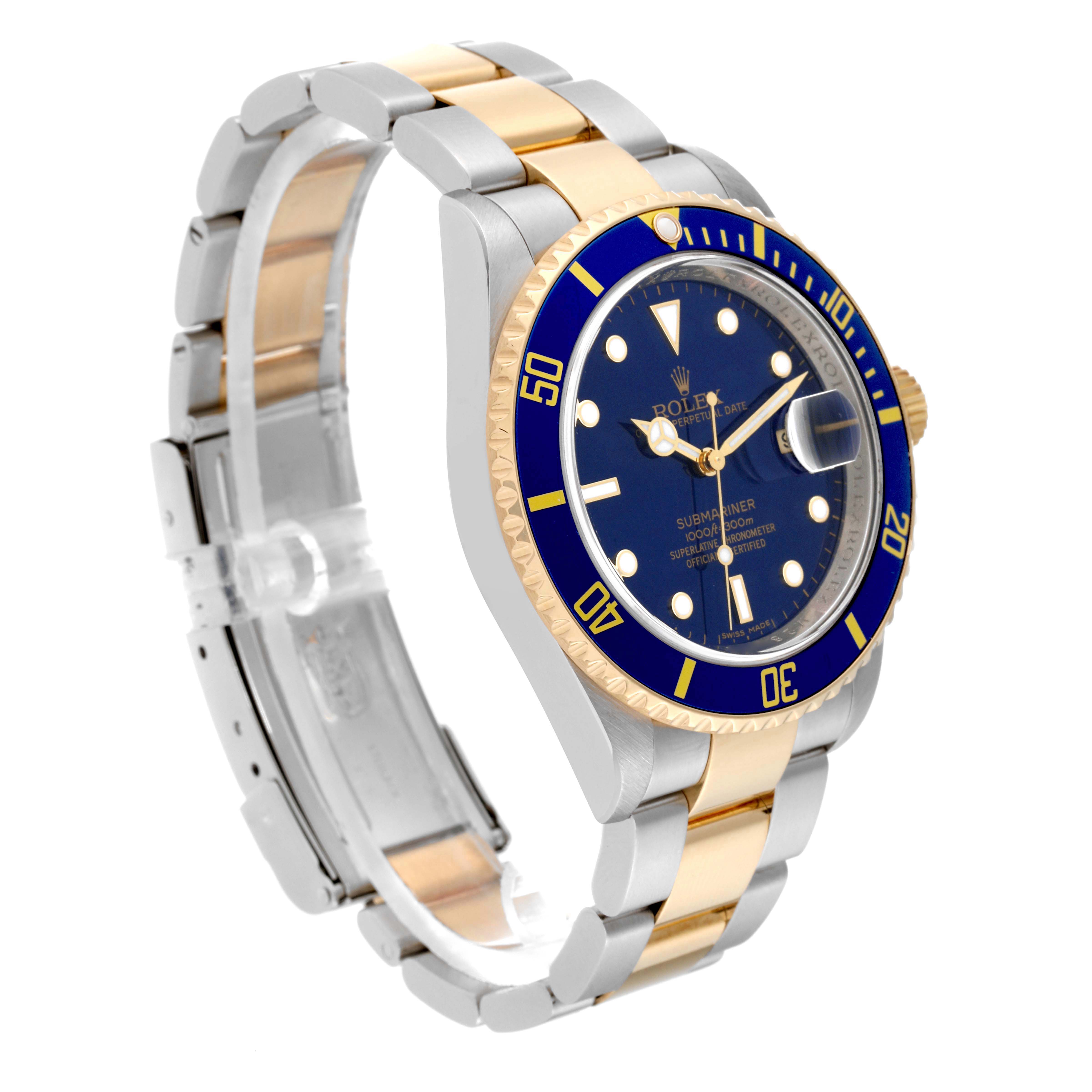 The Rolex Submariner 16613 Men's Steel and Gold (two tone) Blue Dial 16613 Men's Steel and Gold (two tone) Blue Dial watch is shown at an angle displaying the face, bezel, and two-tone bracelet.