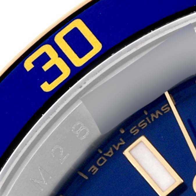 The image shows a close-up of the bezel and part of the dial of a Rolex Submariner 16613 Men's Steel and Gold (two tone) Blue Dial 16613 Men's Steel and Gold (two tone) Blue Dial watch, highlighting the "30" mark.