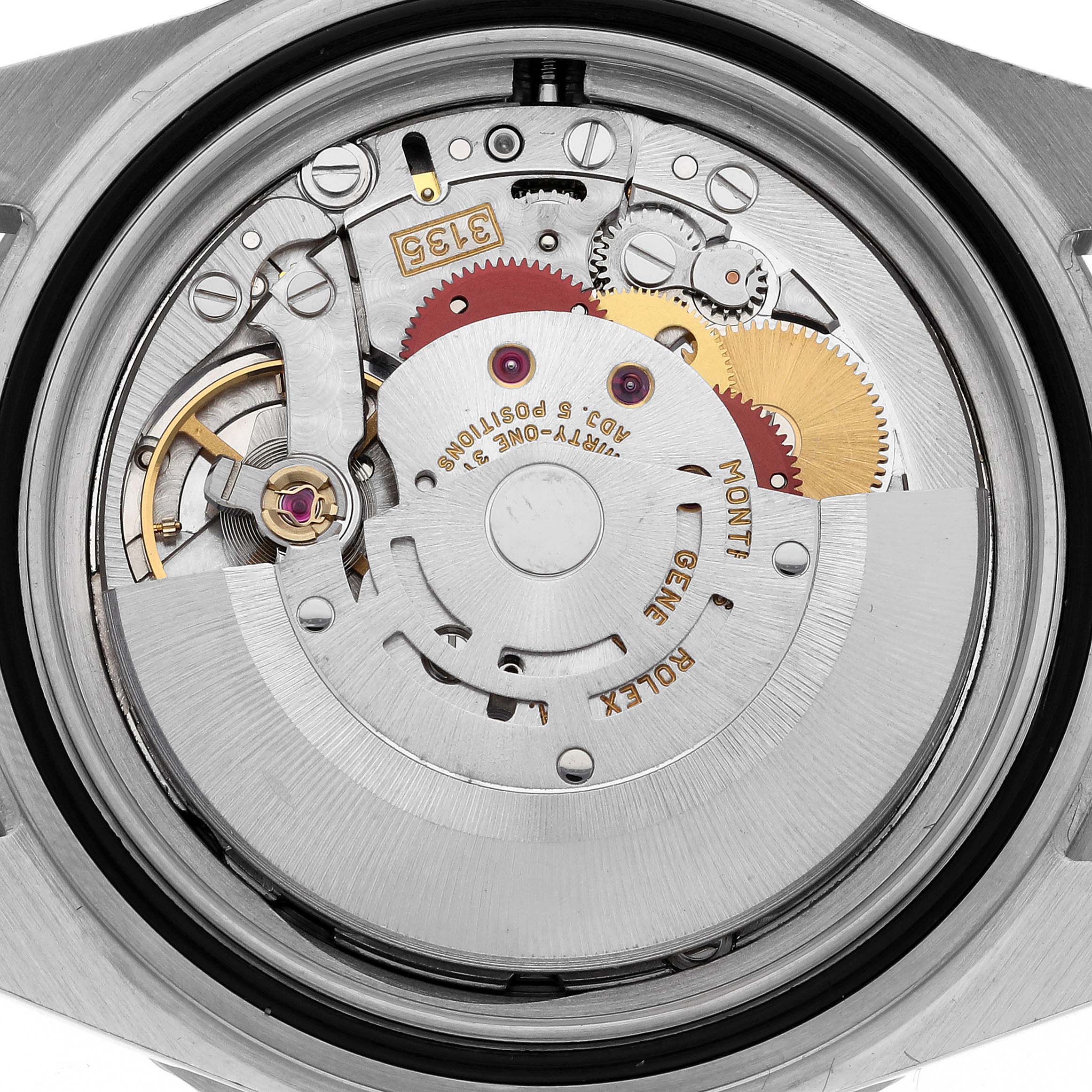 The image shows the internal mechanics and movement of a Rolex Submariner 16610 Men
s Stainless Steel Black Dial 16610 Men
s Stainless Steel Black Dial watch from a back angle.