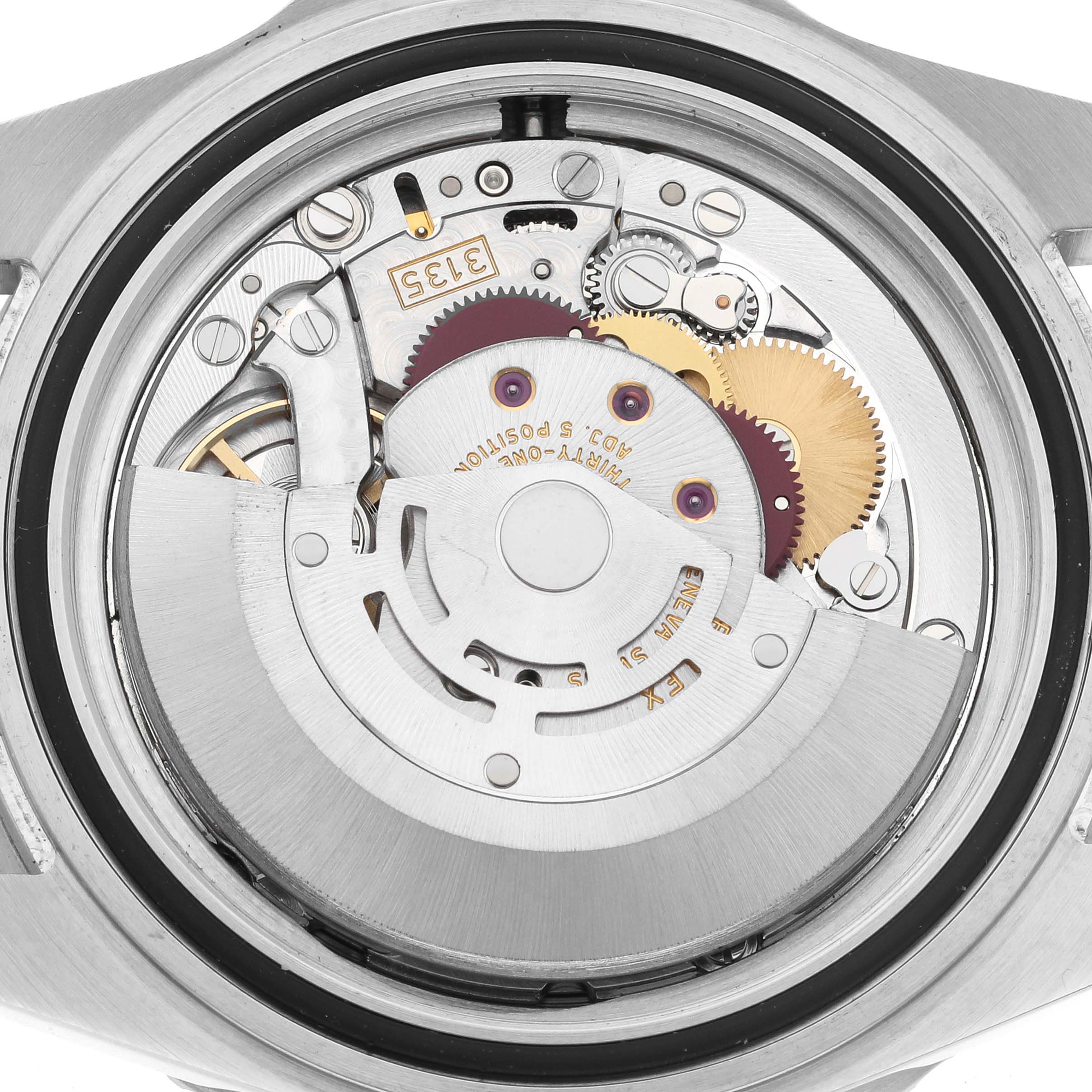 This image shows the intricate internal mechanism of the Rolex Submariner 16610 Men
s Stainless Steel Black Dial 16610 Men
s Stainless Steel Black Dial watch viewed from the case back angle.