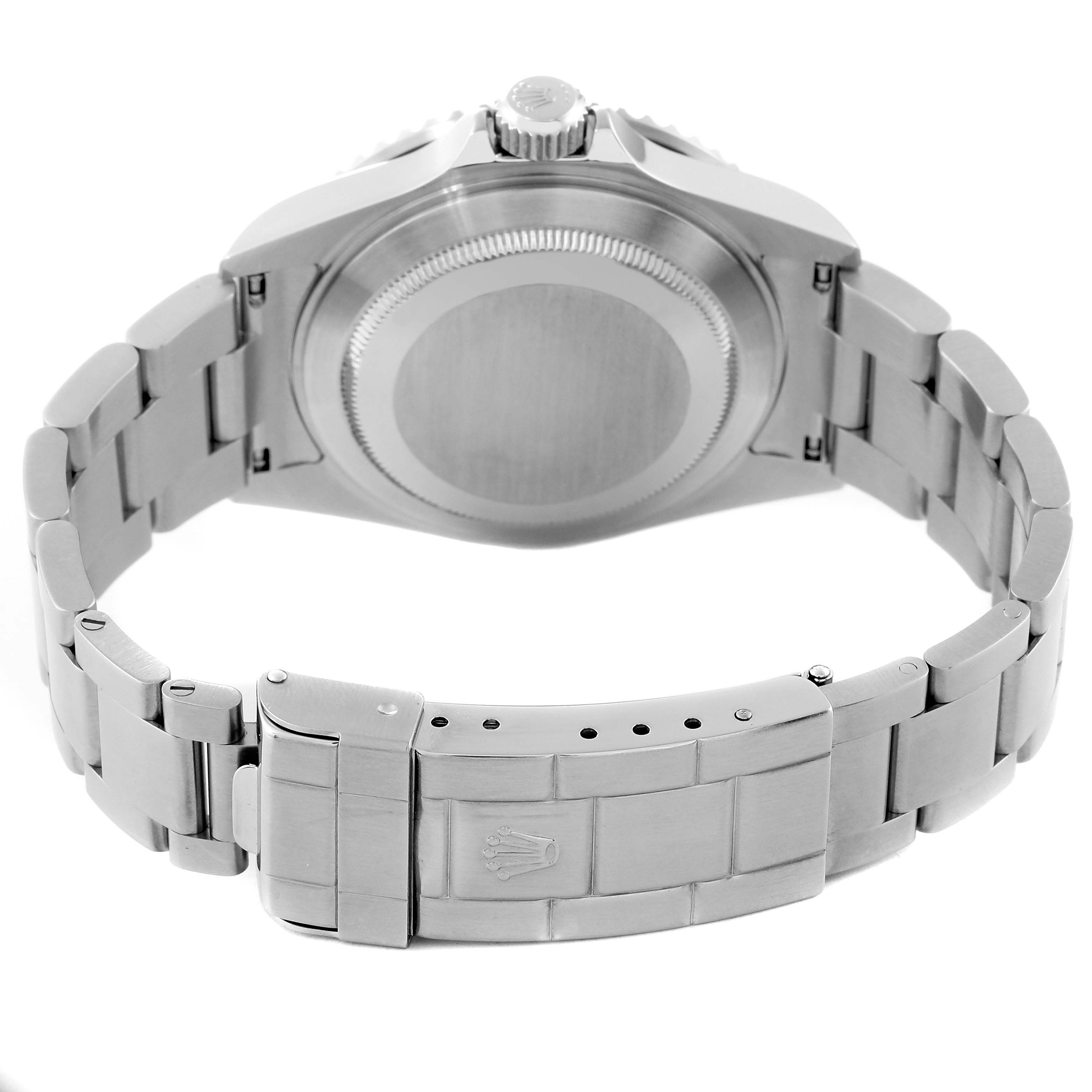 The image shows the back case and metal bracelet clasp of a Rolex Submariner 16610 Men
s Stainless Steel Black Dial 16610 Men
s Stainless Steel Black Dial watch.