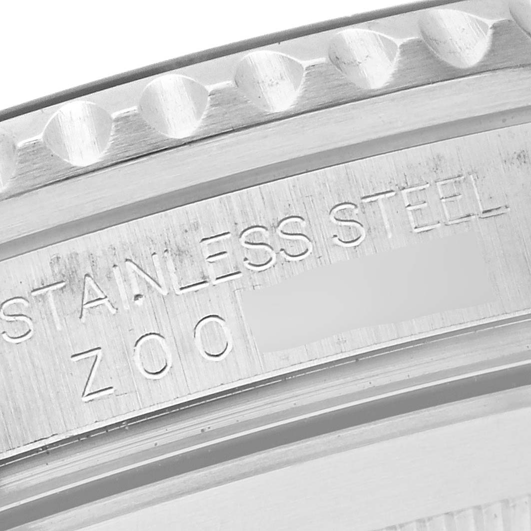 Close-up angle showing the bezel edge and "Stainless Steel" engraving on a Rolex Submariner 16610 Men
s Stainless Steel Black Dial 16610 Men
s Stainless Steel Black Dial model.