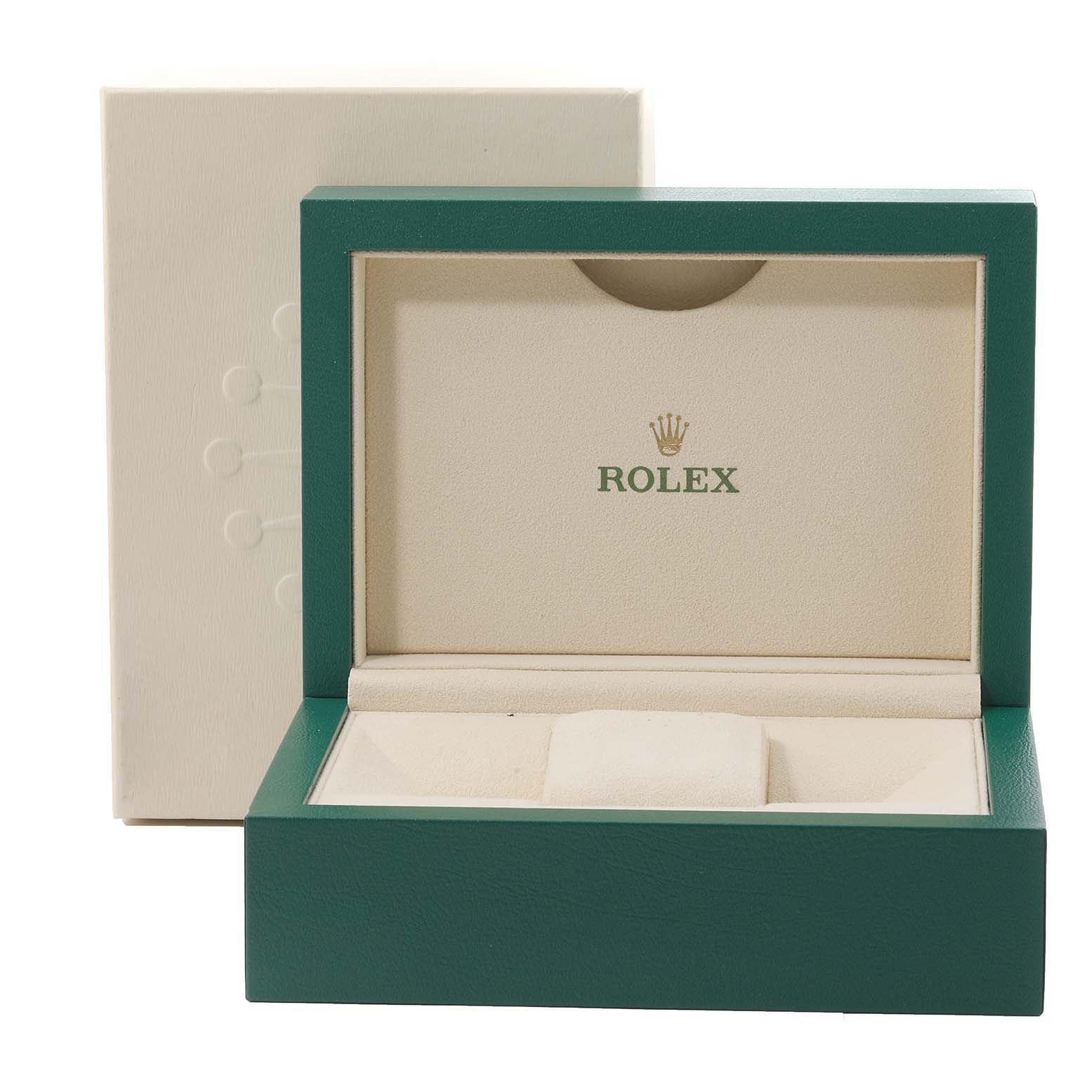 This image shows an open green Rolex watch box for the Yacht-Master model.