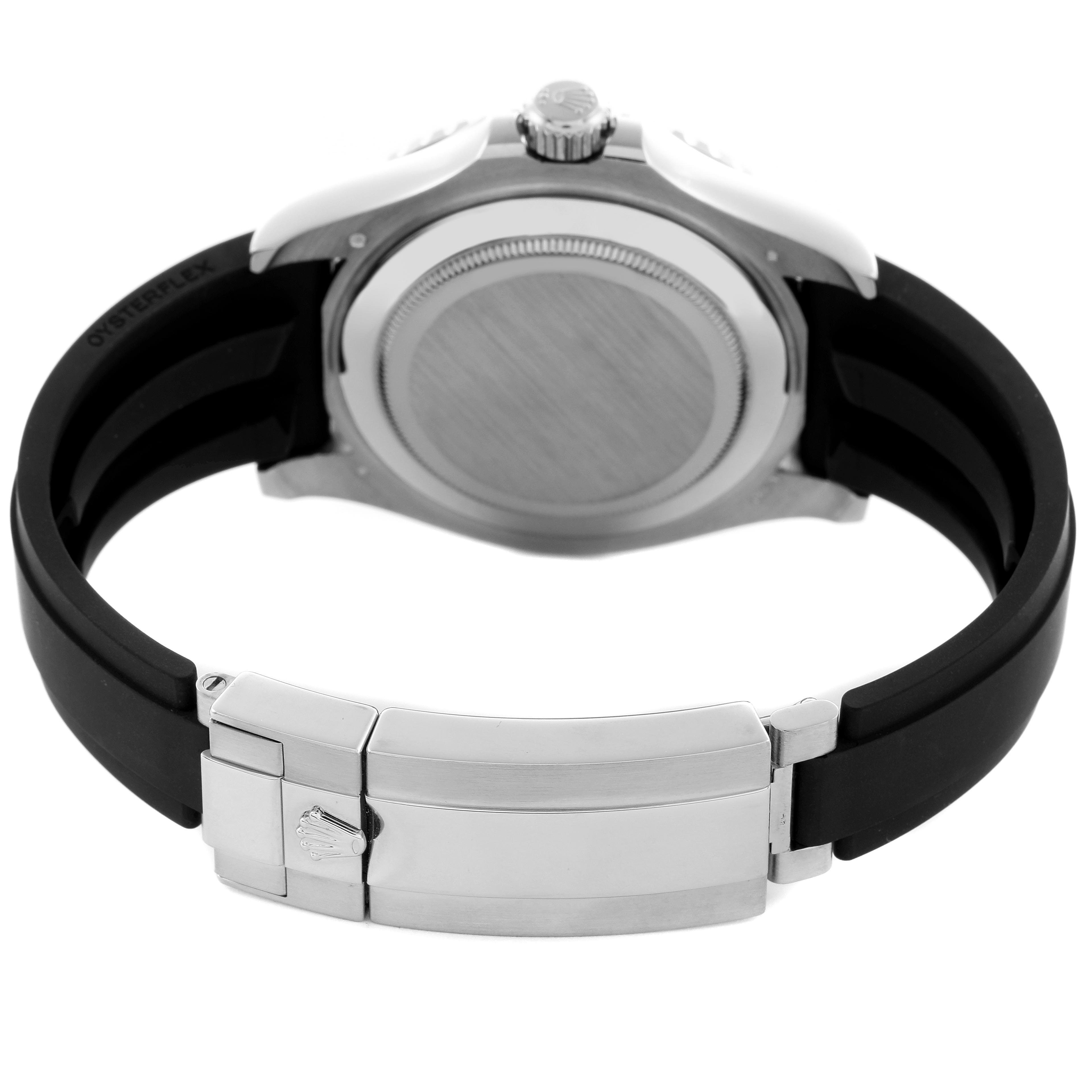 The Rolex Yacht-Master 226659 Men
s White Gold Black Dial 226659 Men
s White Gold Black Dial watch is shown from the back, highlighting the case back, crown, and black strap with a metal clasp.